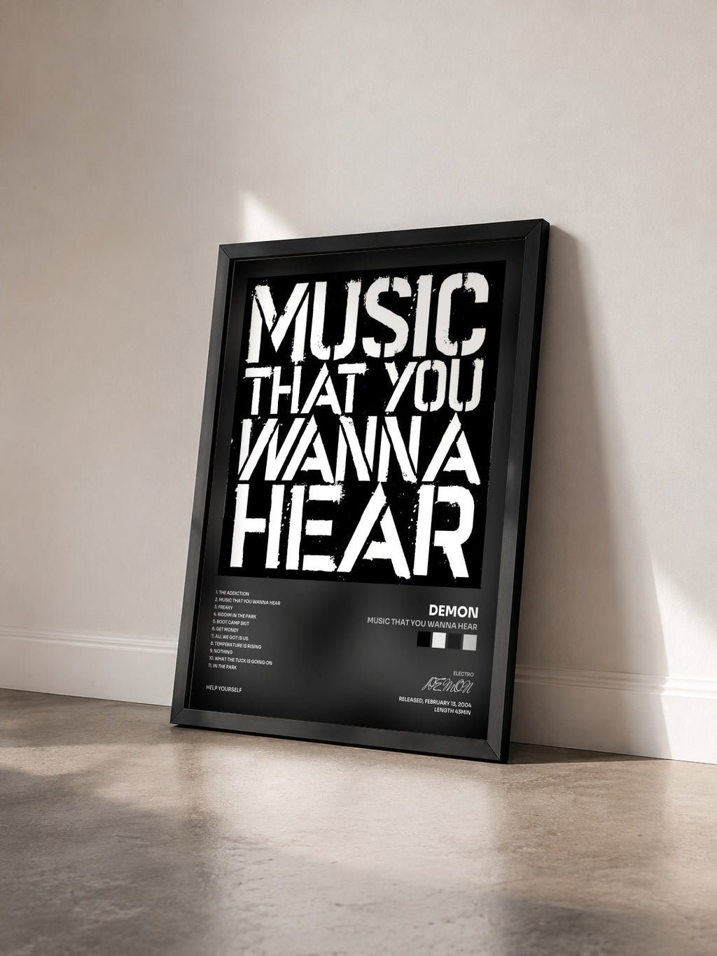 #noir Tableau de l'album Music That You Wanna Hear de DEMON vu de trois quarts, cadre noir