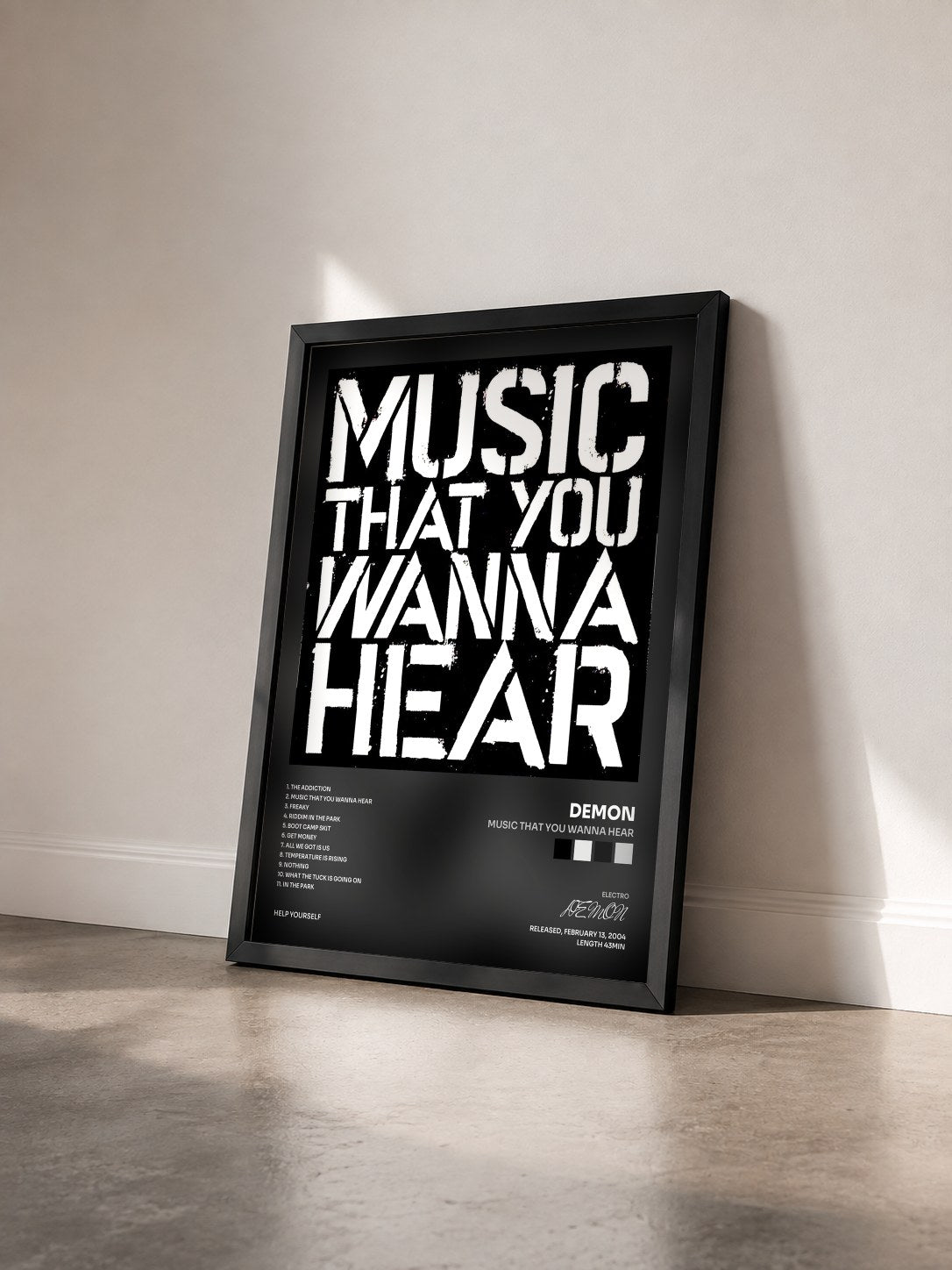 #noir Tableau de l'album Music That You Wanna Hear de DEMON vu de trois quarts, cadre noir