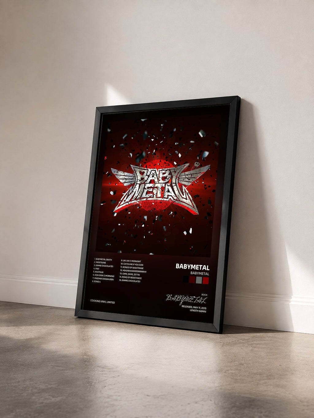 #noir Tableau de l'album BABYMETAL de BABYMETAL vu de trois quarts, cadre noir