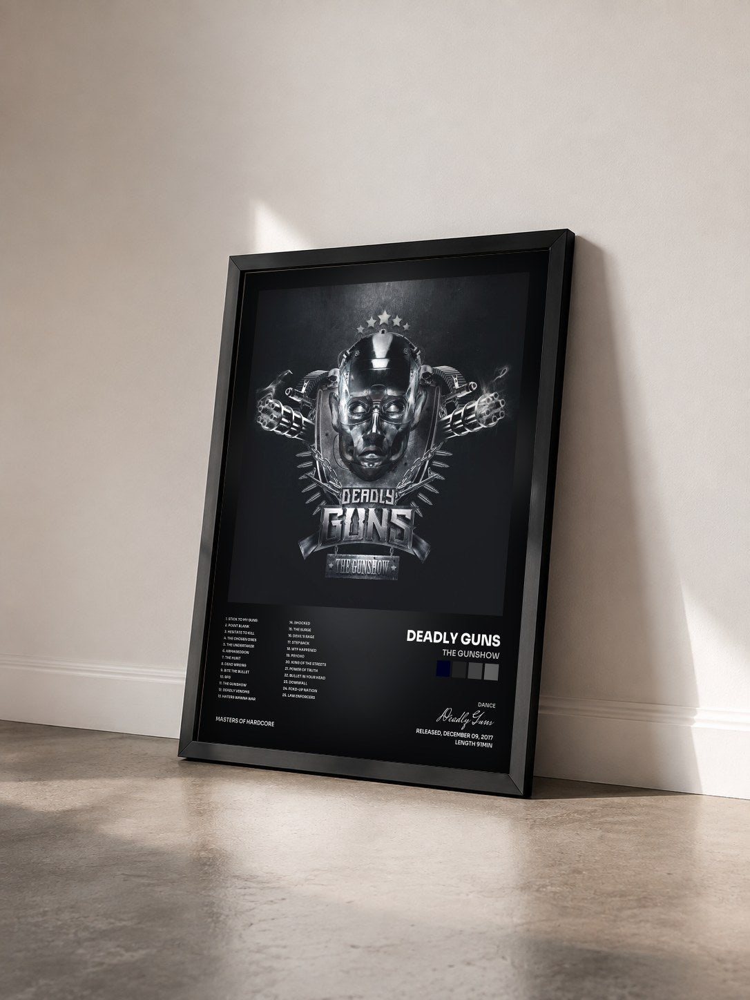 #noir Tableau de l'album The Gunshow de Deadly Guns vu de trois quarts, cadre noir