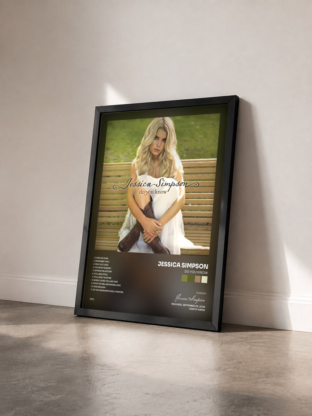 #noir Tableau de l'album Do You Know de Jessica Simpson vu de trois quarts, cadre noir