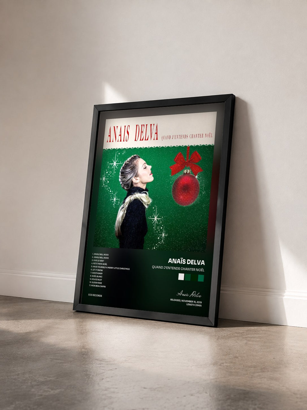 #noir Tableau de l'album Quand j'entends chanter Noël de Anaïs Delva vu de trois quarts, cadre noir