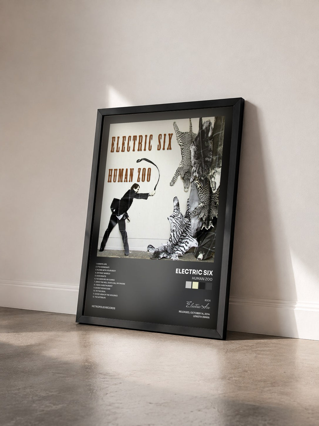 #noir Tableau de l'album Human Zoo de Electric Six vu de trois quarts, cadre noir