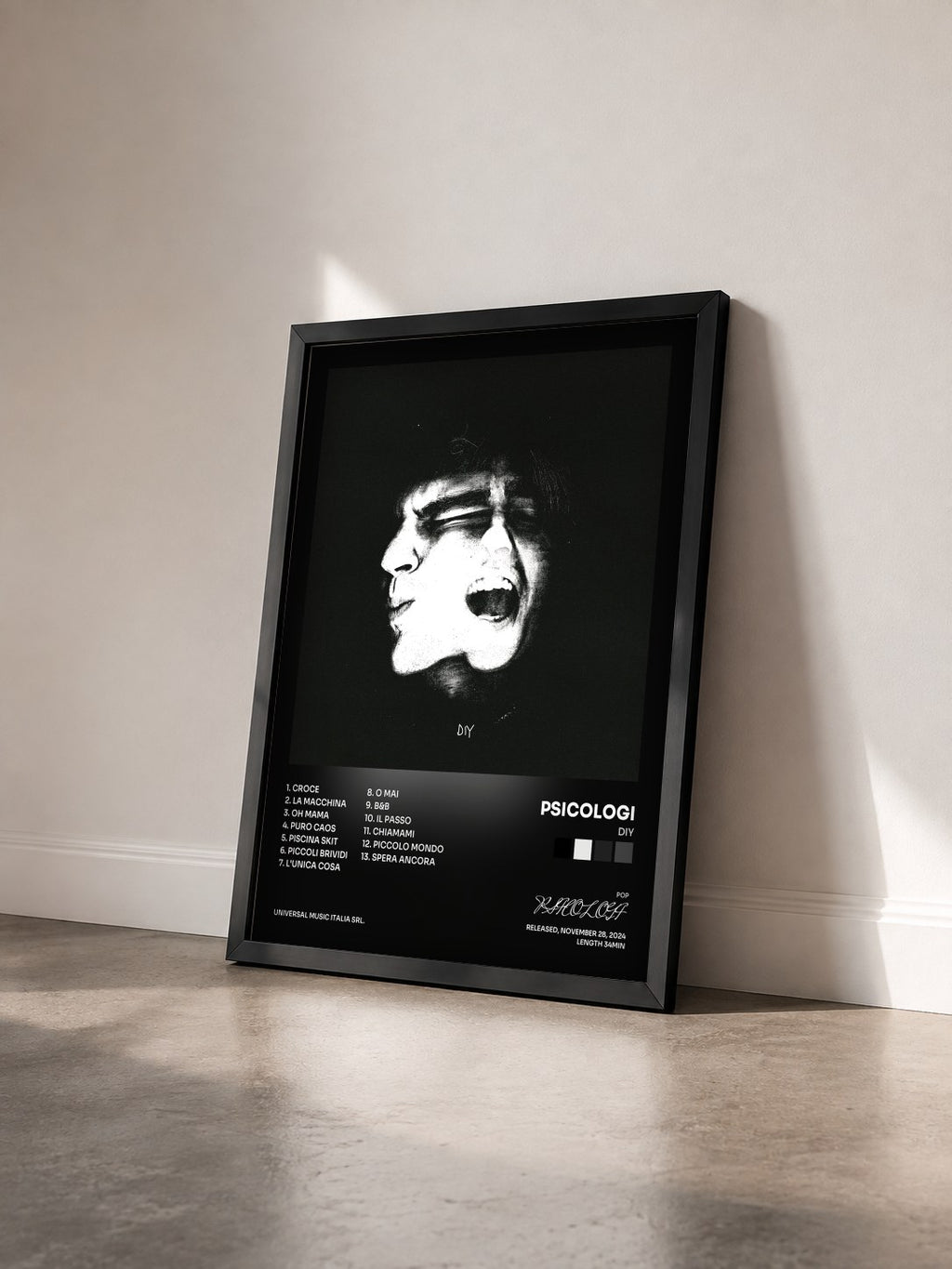 #noir Tableau de l'album DIY de PSICOLOGI vu de trois quarts, cadre noir