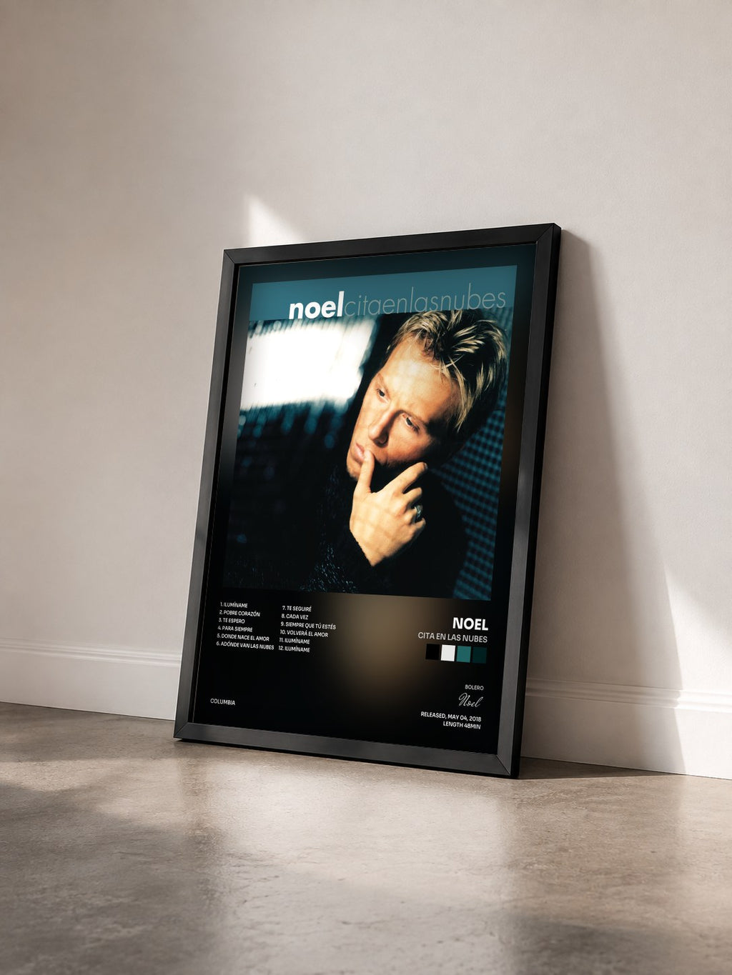 #noir Tableau de l'album Cita en las Nubes de Noel vu de trois quarts, cadre noir