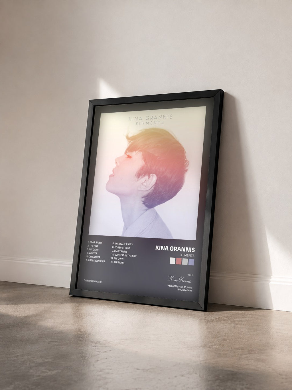 #noir Tableau de l'album Elements de Kina Grannis vu de trois quarts, cadre noir