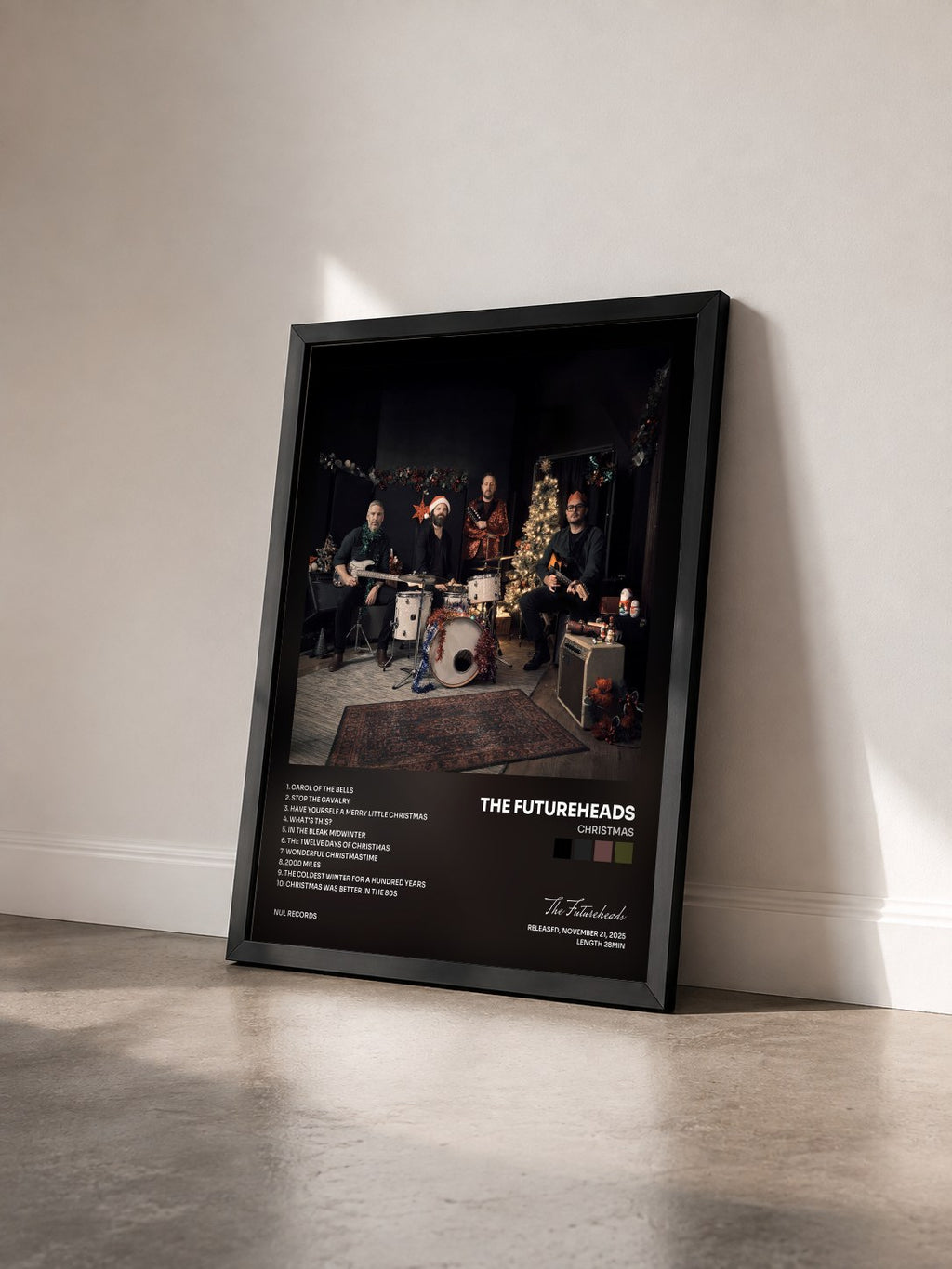 #noir Tableau de l'album Christmas de The Futureheads vu de trois quarts, cadre noir