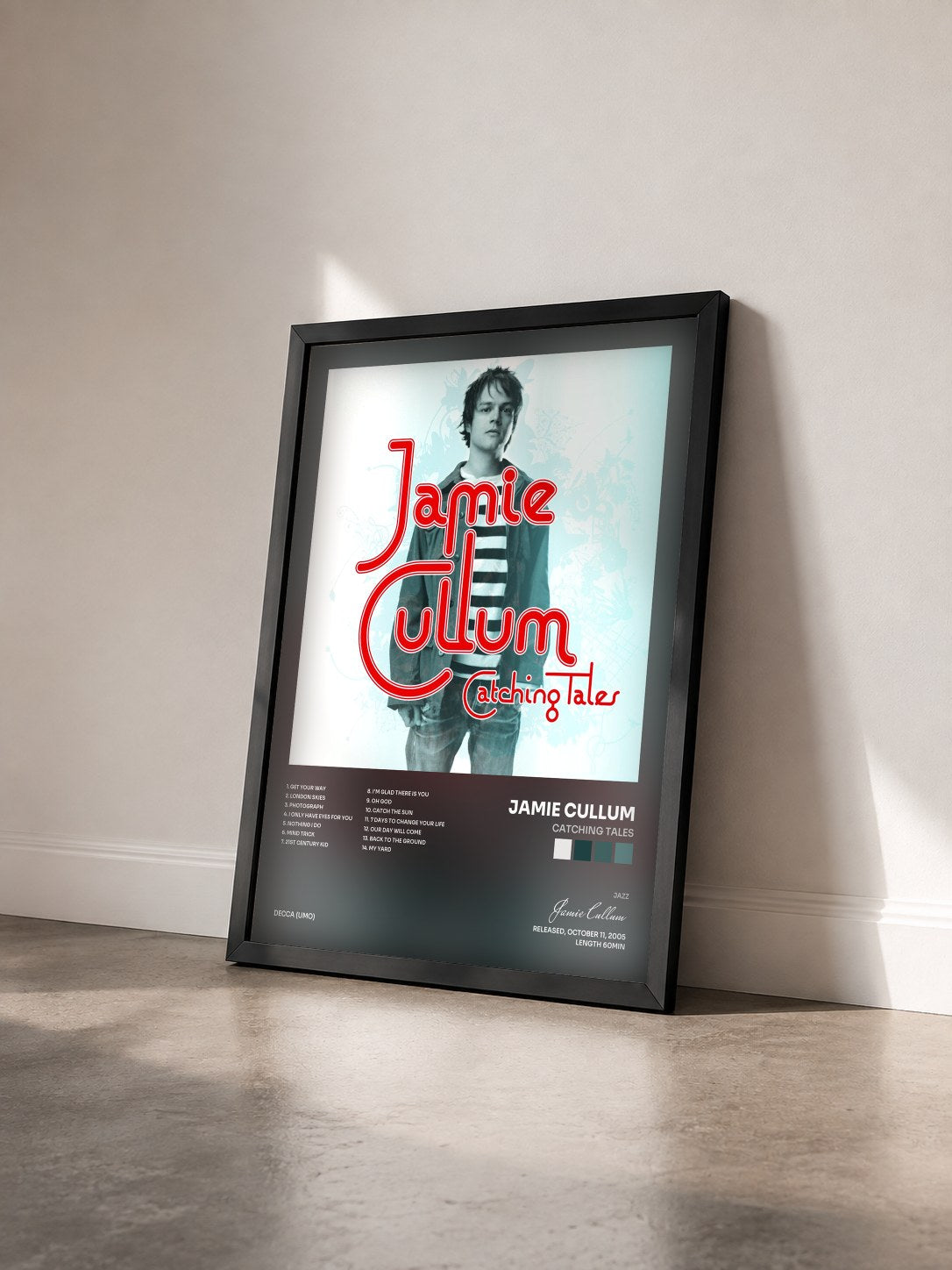 #noir Tableau de l'album Catching Tales de Jamie Cullum vu de trois quarts, cadre noir