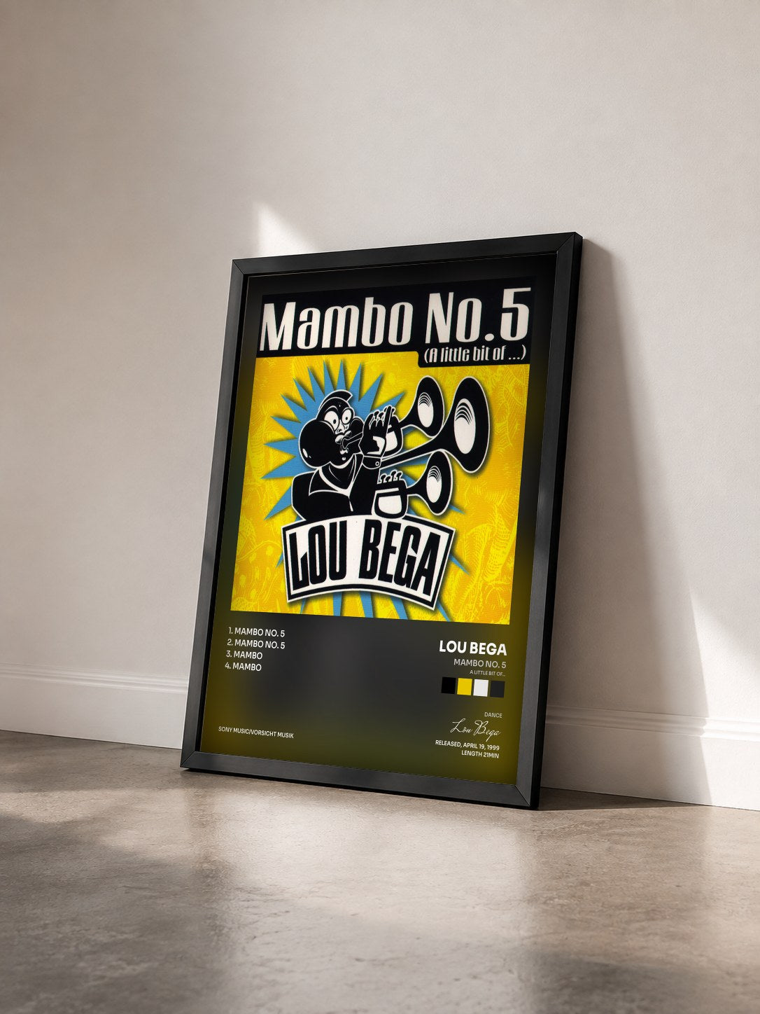 #noir Tableau de l'album Mambo No. 5 (A Little Bit Of...) de Lou Bega vu de trois quarts, cadre noir