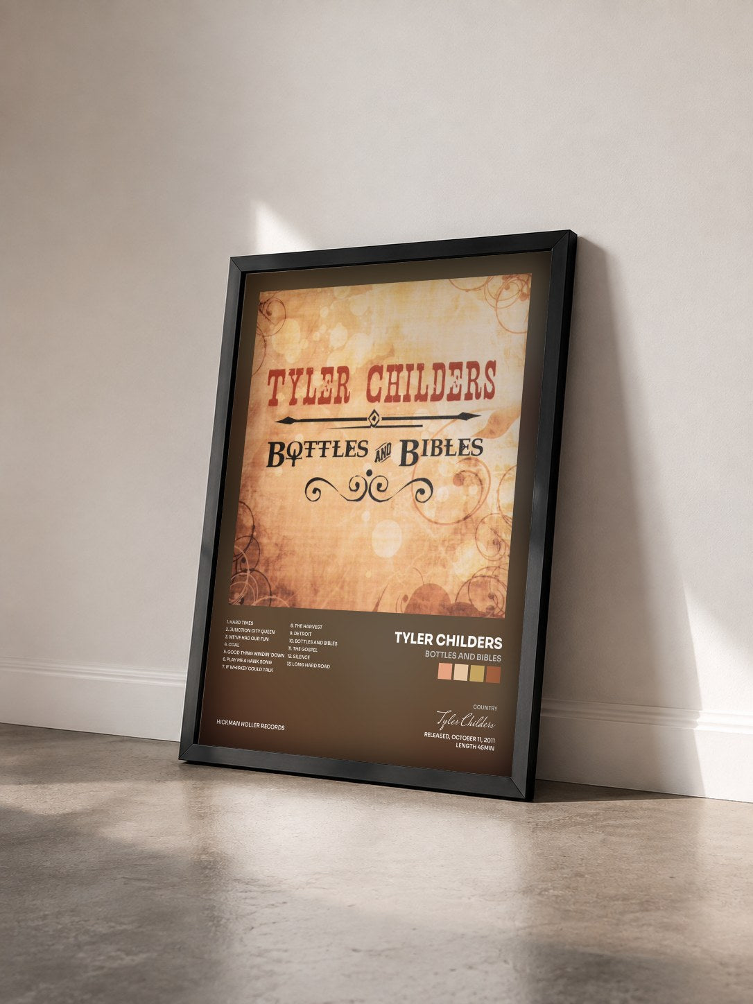 #noir Tableau de l'album Bottles and Bibles de Tyler Childers vu de trois quarts, cadre noir