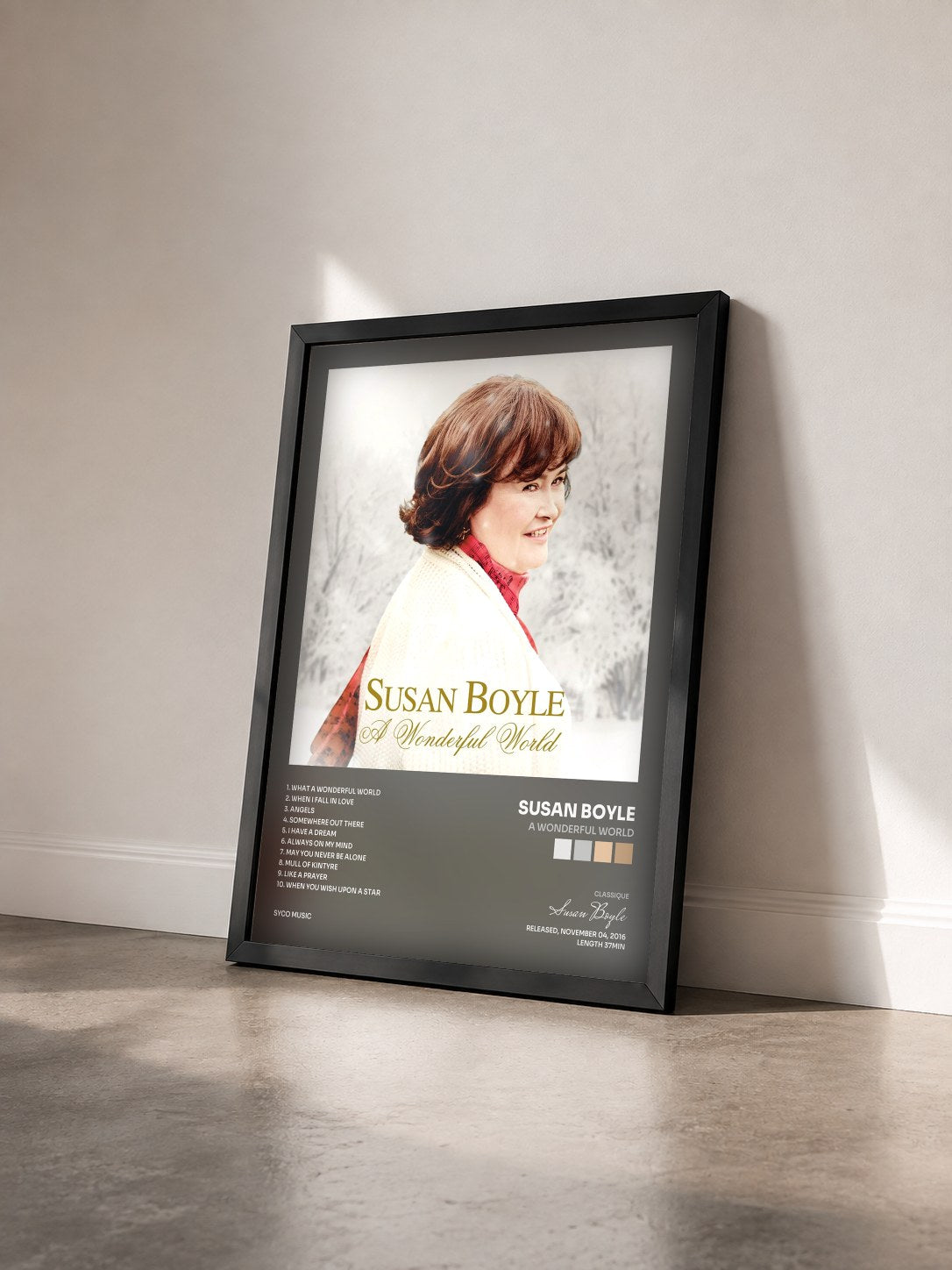 #noir Tableau de l'album A Wonderful World de Susan Boyle vu de trois quarts, cadre noir
