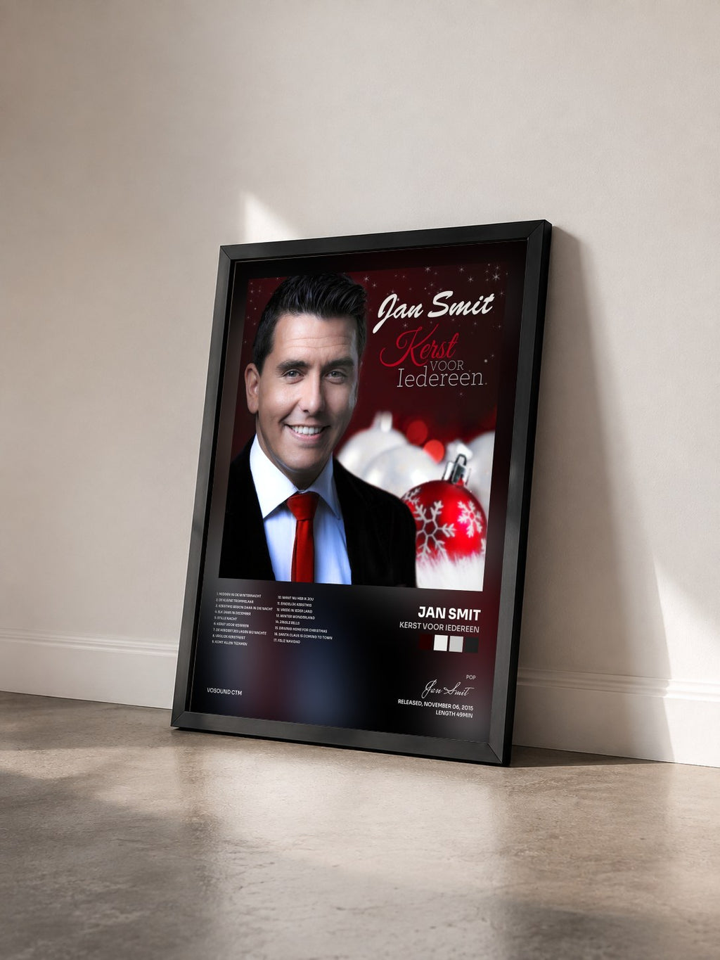 #noir Tableau de l'album Kerst Voor Iedereen de Jan Smit vu de trois quarts, cadre noir