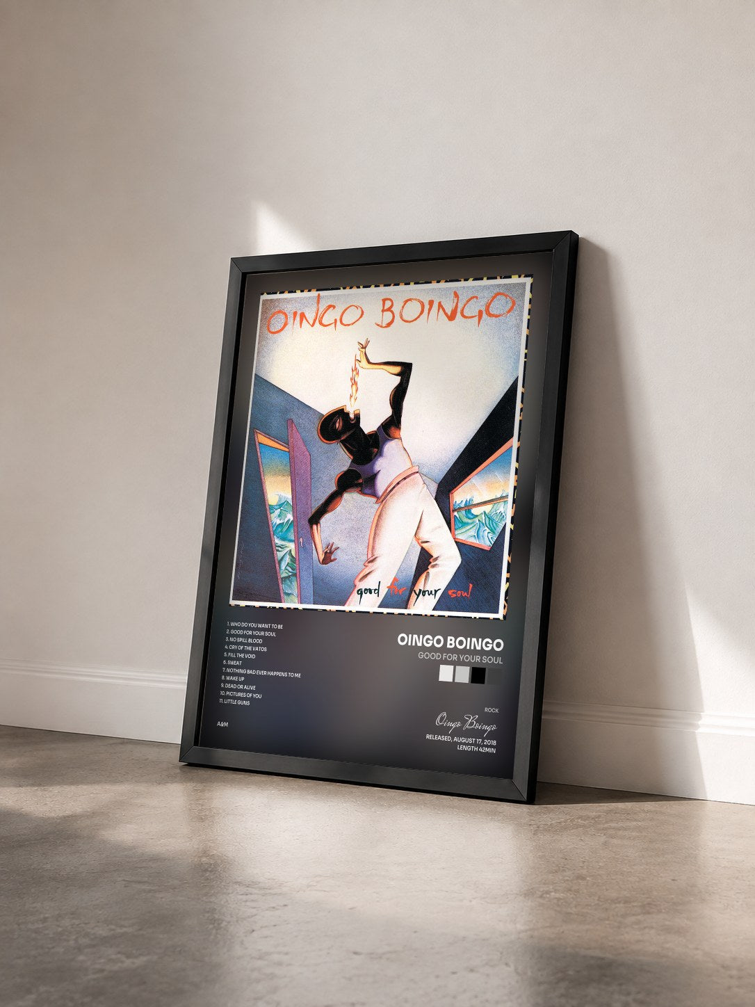 #noir Tableau de l'album Good For Your Soul de Oingo Boingo vu de trois quarts, cadre noir