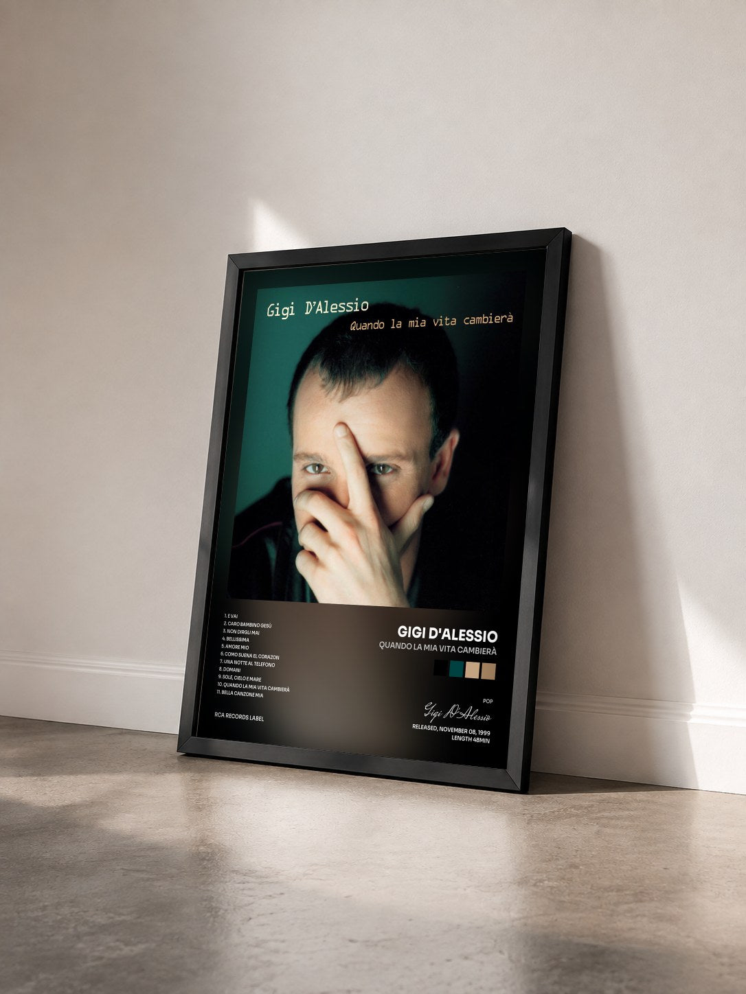#noir Tableau de l'album Quando La Mia Vita Cambierà de Gigi D'Alessio vu de trois quarts, cadre noir