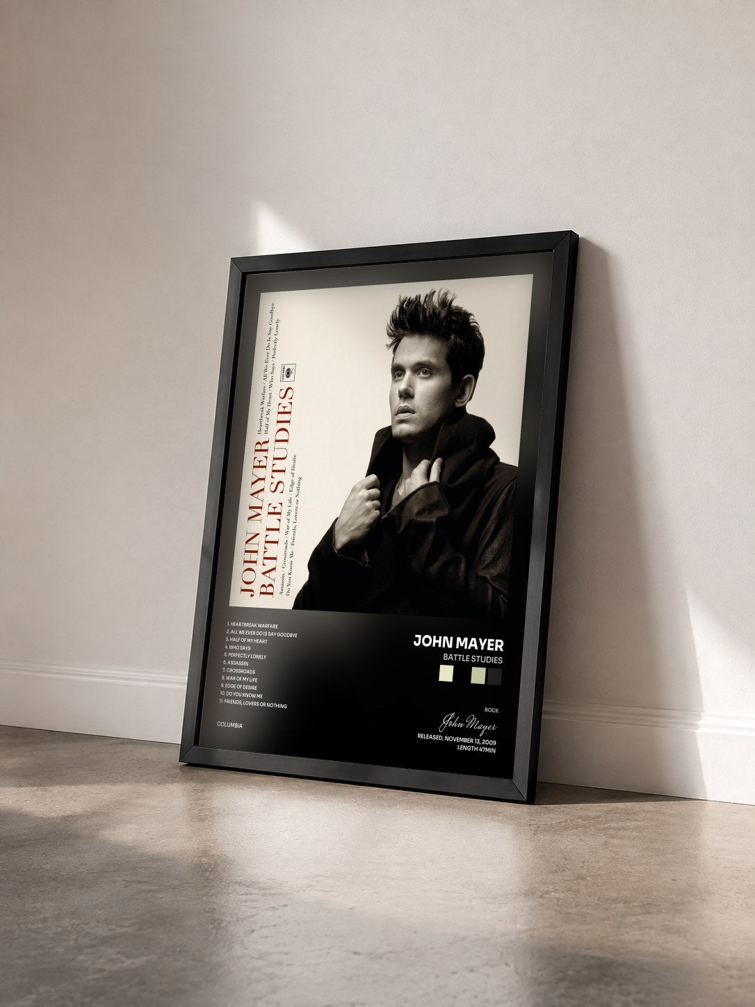 #noir Tableau de l'album Battle Studies de John Mayer vu de trois quarts, cadre noir