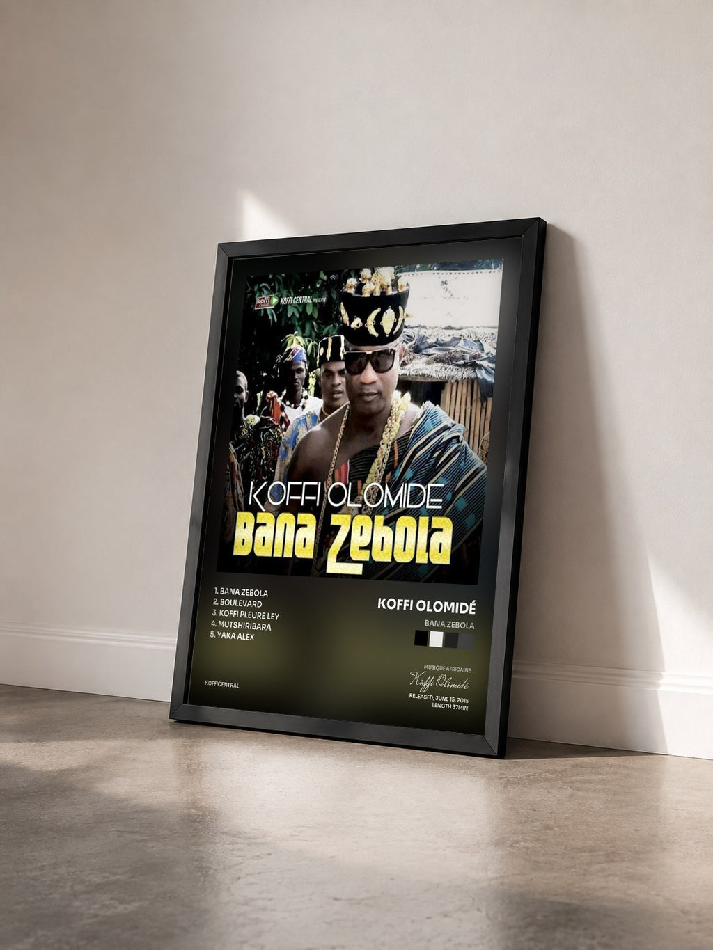 #noir Tableau de l'album Bana Zebola de Koffi Olomidé vu de trois quarts, cadre noir