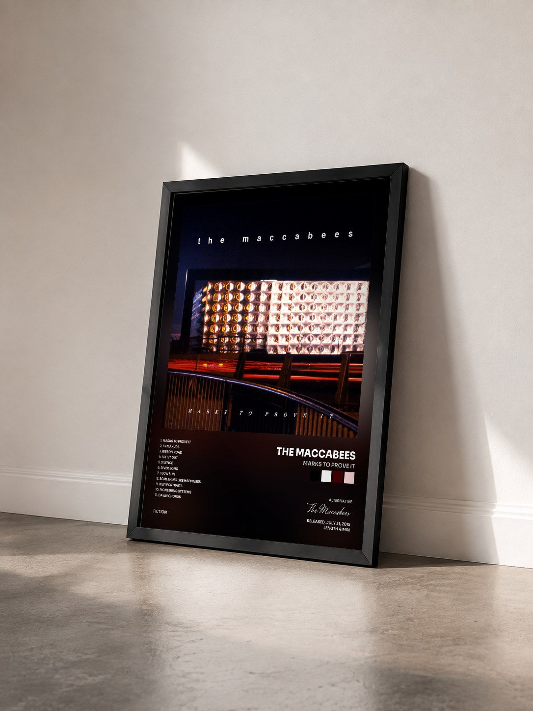 #noir Tableau de l'album Marks To Prove It de The Maccabees vu de trois quarts, cadre noir