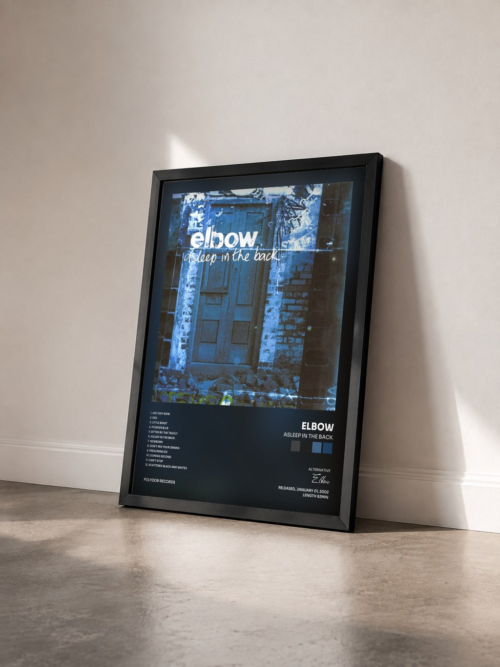 #noir Tableau de l'album Asleep In The Back de Elbow vu de trois quarts, cadre noir