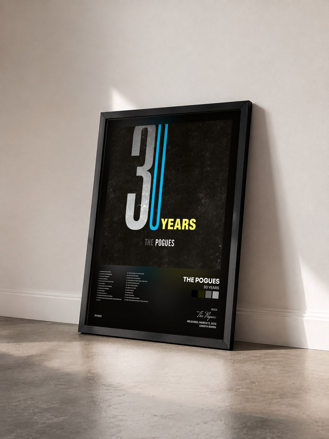 #noir Tableau de l'album 30 Years de The Pogues vu de trois quarts, cadre noir
