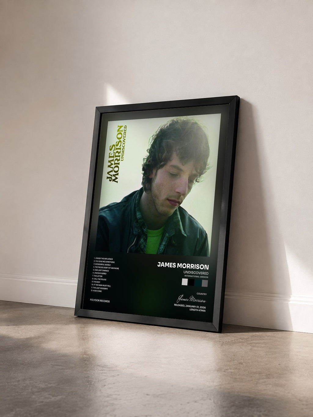 #noir Tableau de l'album Undiscovered (International Version) de James Morrison vu de trois quarts, cadre noir