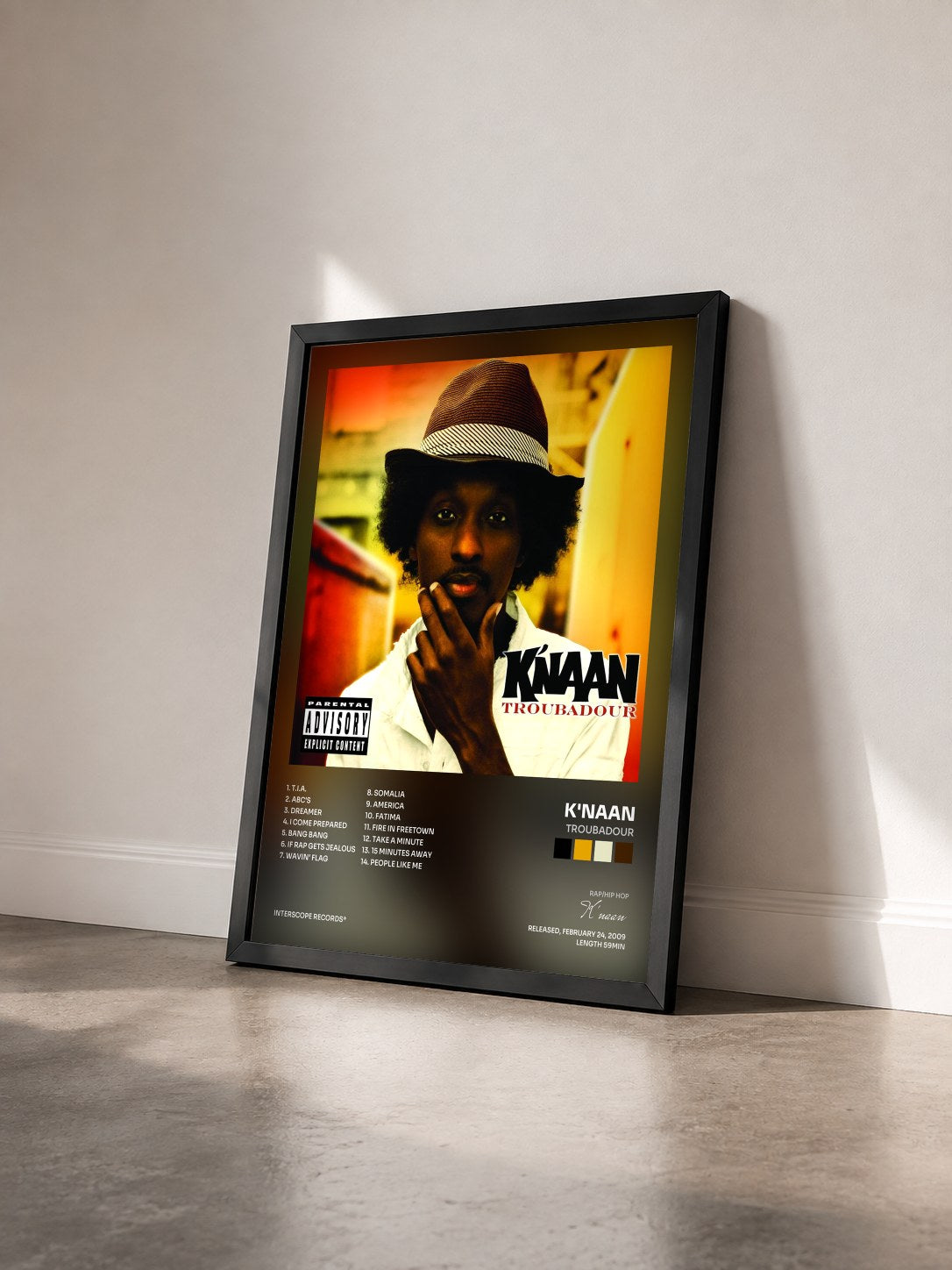 #noir Tableau de l'album Troubadour de K'naan vu de trois quarts, cadre noir