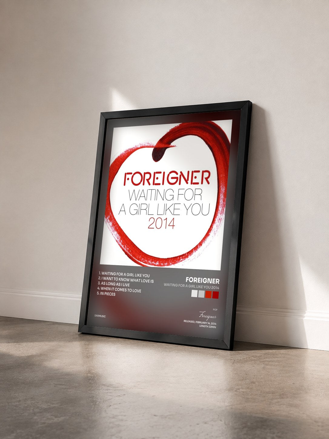 #noir Tableau de l'album Waiting for a Girl Like You 2014 de Foreigner vu de trois quarts, cadre noir