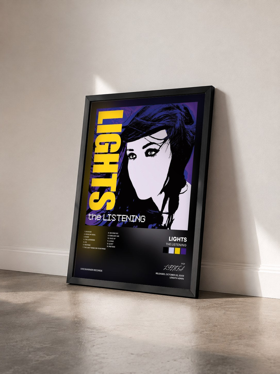 #noir Tableau de l'album The Listening de LIGHTS vu de trois quarts, cadre noir