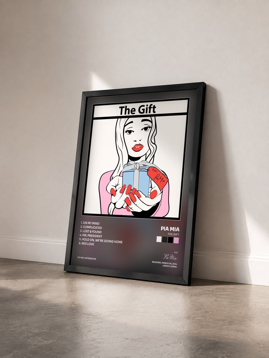 #noir Tableau de l'album The Gift de Pia Mia vu de trois quarts, cadre noir