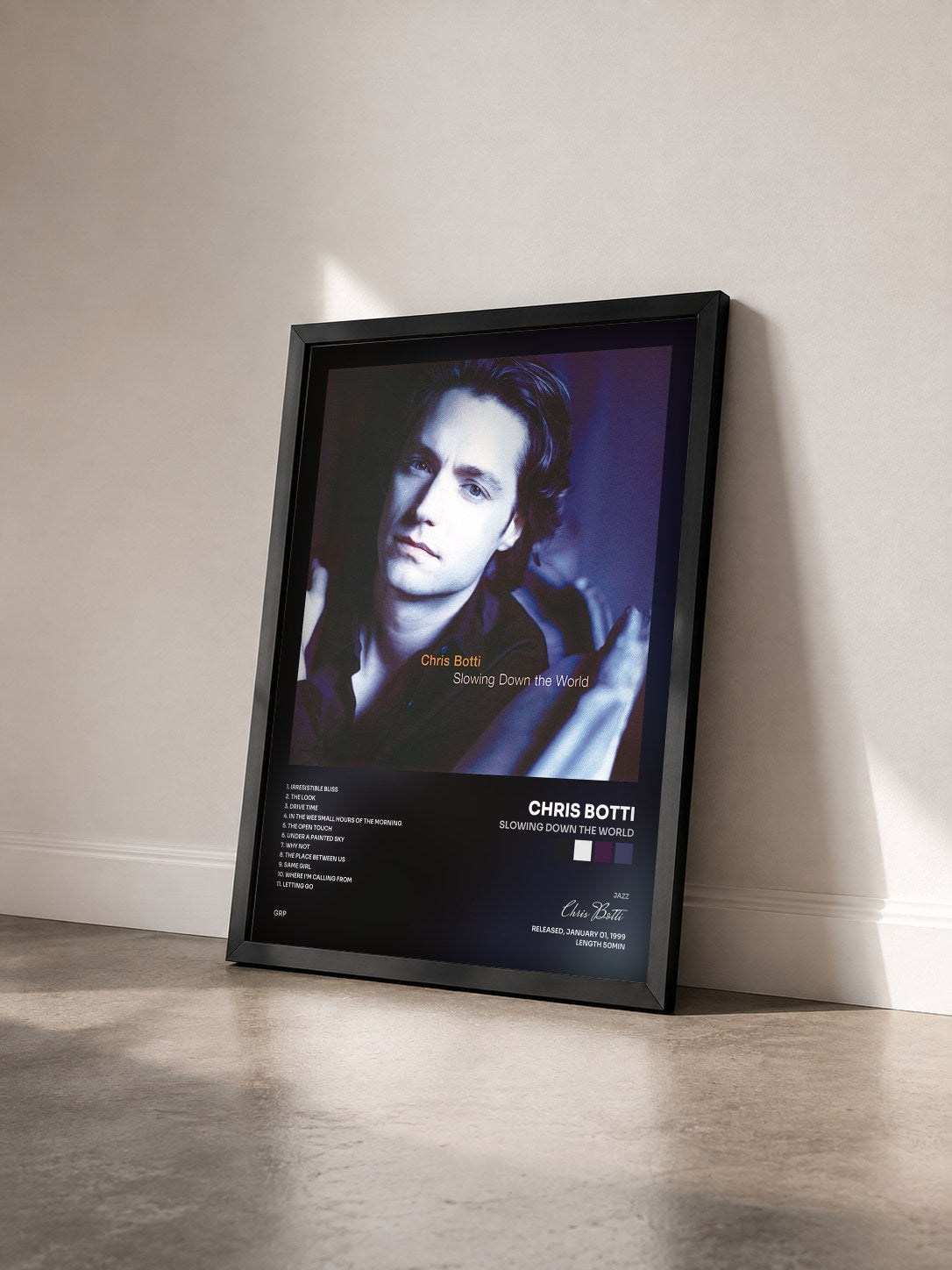 #noir Tableau de l'album Slowing Down The World de Chris Botti vu de trois quarts, cadre noir