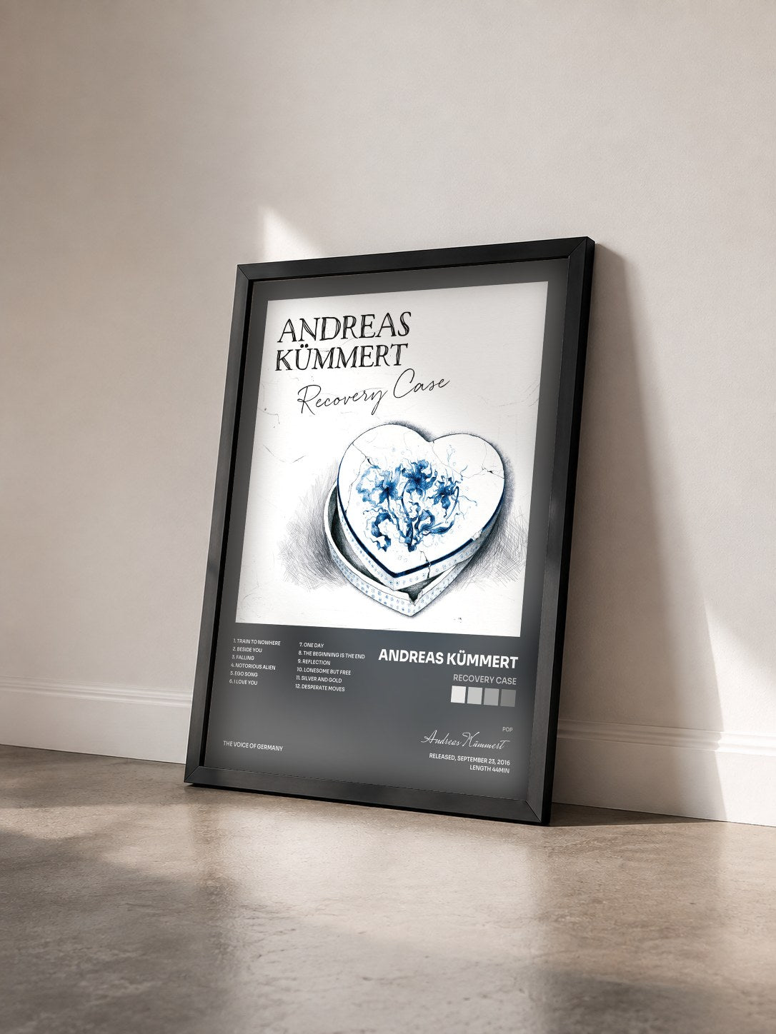 #noir Tableau de l'album Recovery Case de Andreas Kümmert vu de trois quarts, cadre noir