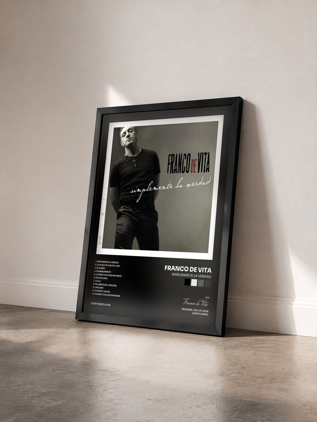 #noir Tableau de l'album Simplemente La Verdad de Franco de Vita vu de trois quarts, cadre noir