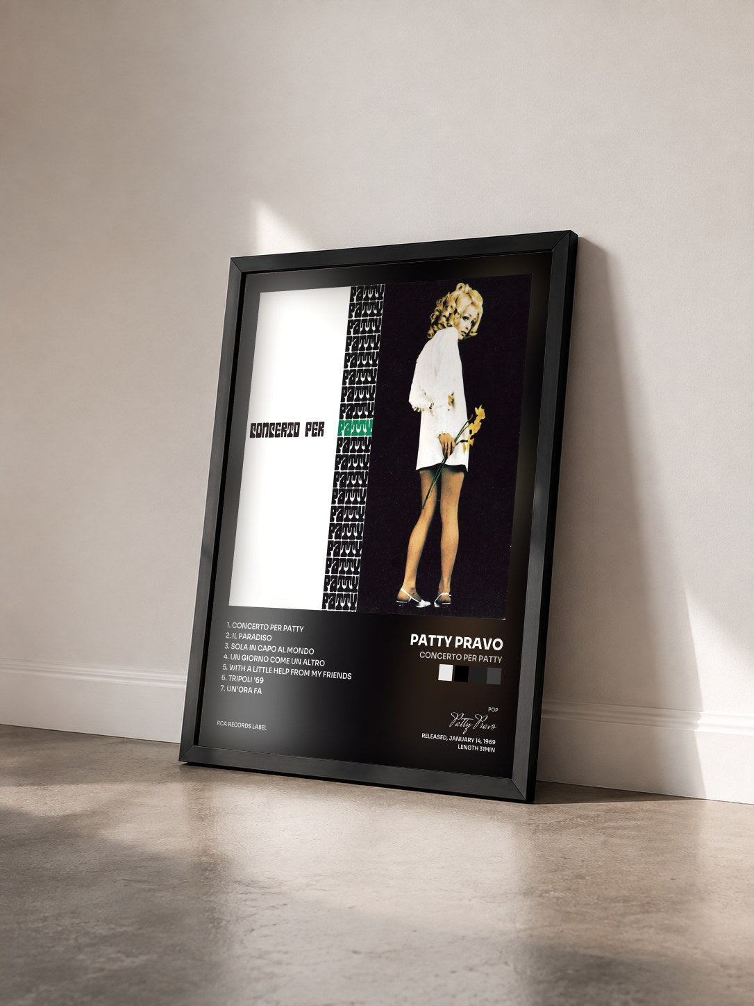 #noir Tableau de l'album Concerto Per Patty de Patty Pravo vu de trois quarts, cadre noir