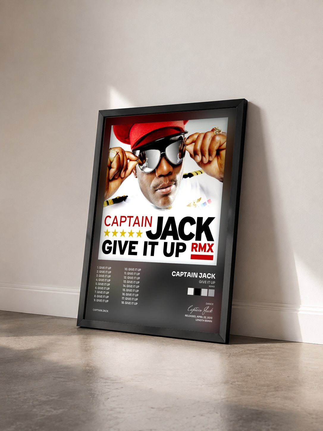 #noir Tableau de l'album Give It Up (Remix) de Captain Jack vu de trois quarts, cadre noir