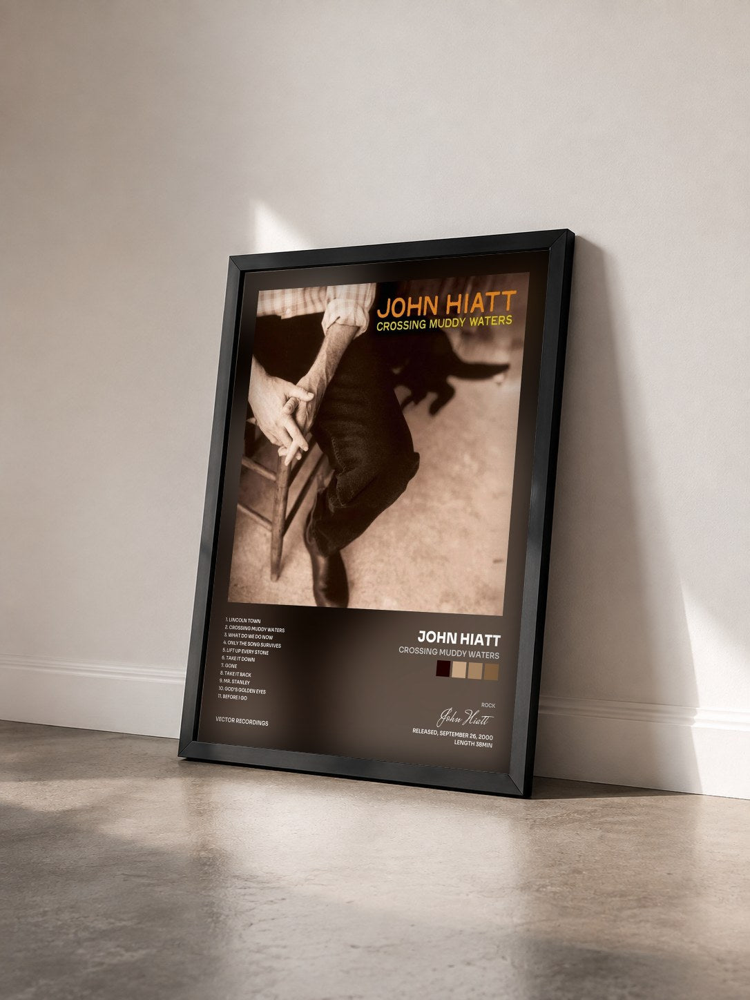 #noir Tableau de l'album Crossing Muddy Waters de John Hiatt vu de trois quarts, cadre noir