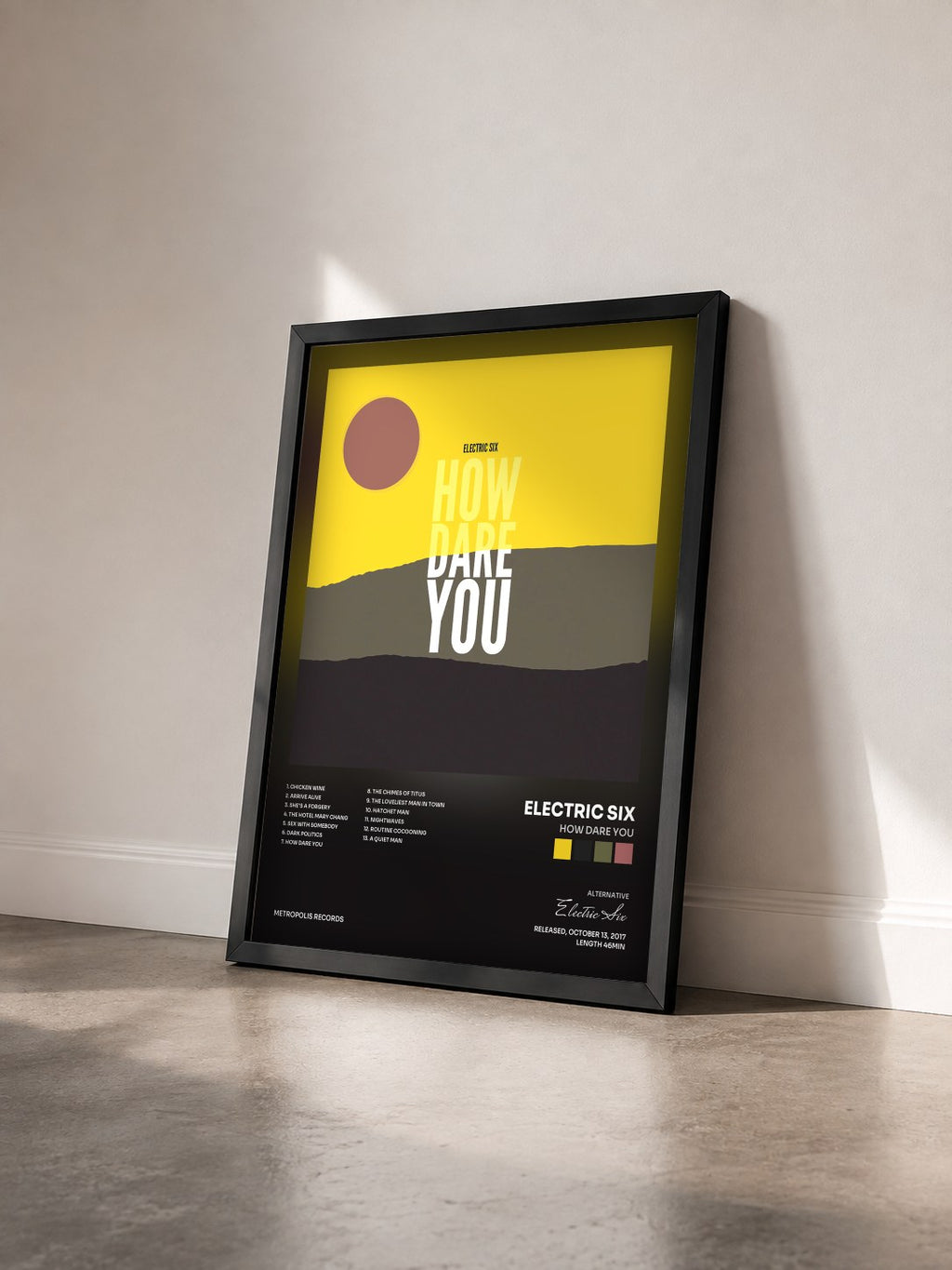 #noir Tableau de l'album How Dare You de Electric Six vu de trois quarts, cadre noir
