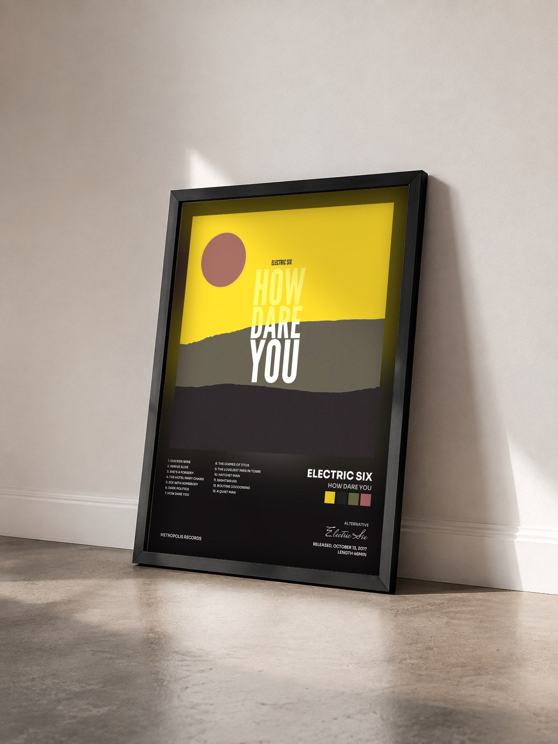 #noir Tableau de l'album How Dare You de Electric Six vu de trois quarts, cadre noir