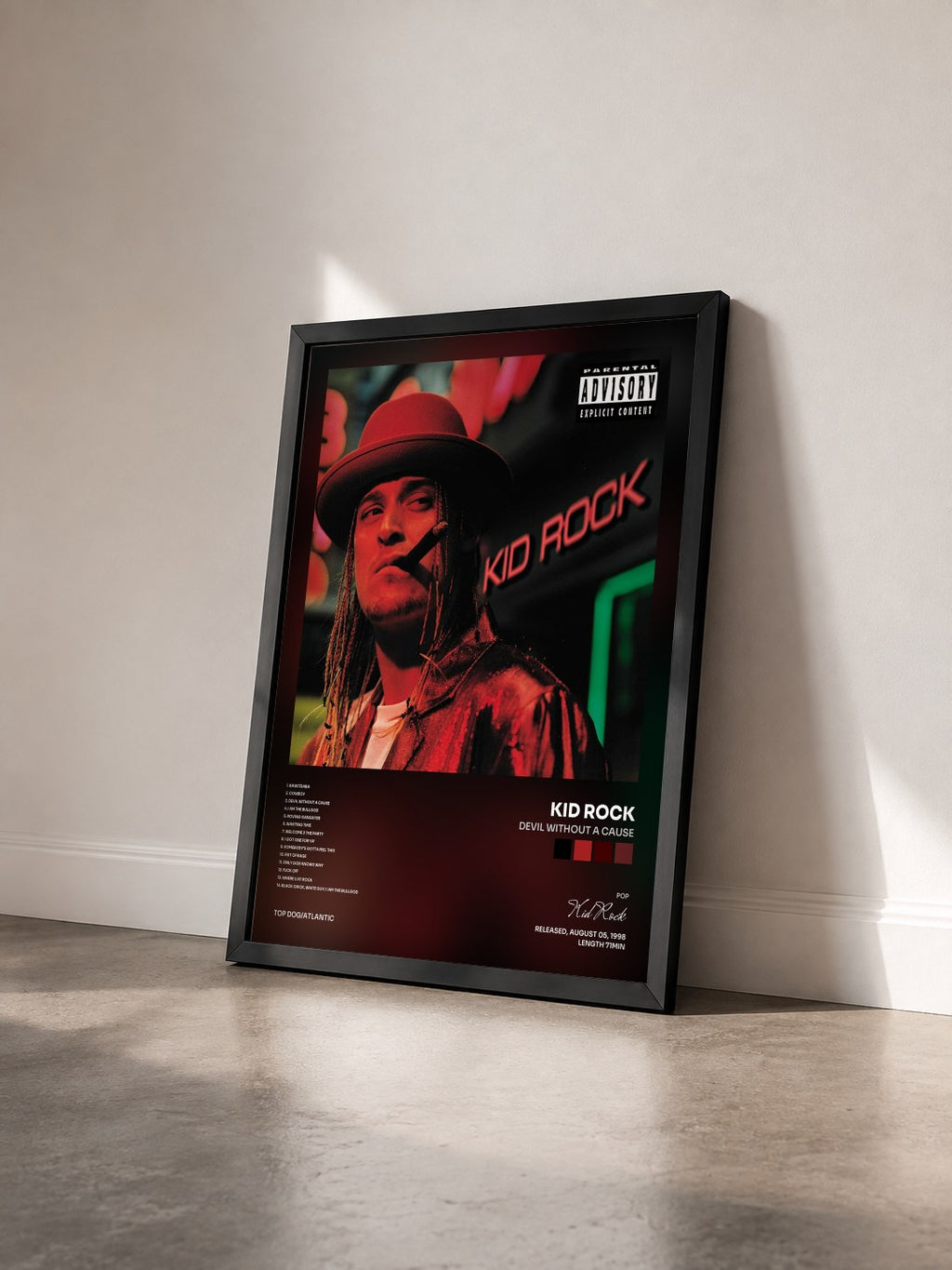 #noir Tableau de l'album Devil Without a Cause de Kid Rock vu de trois quarts, cadre noir