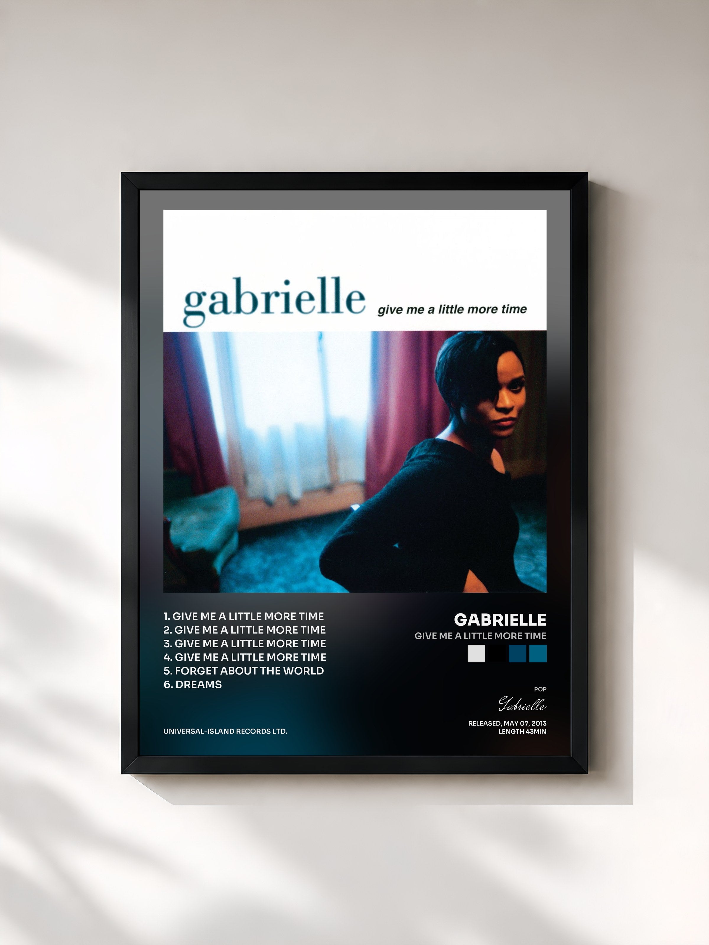 #noir Tableau de l'album Give Me A Little More Time de Gabrielle, cadre noir, imprimé et encadré en France