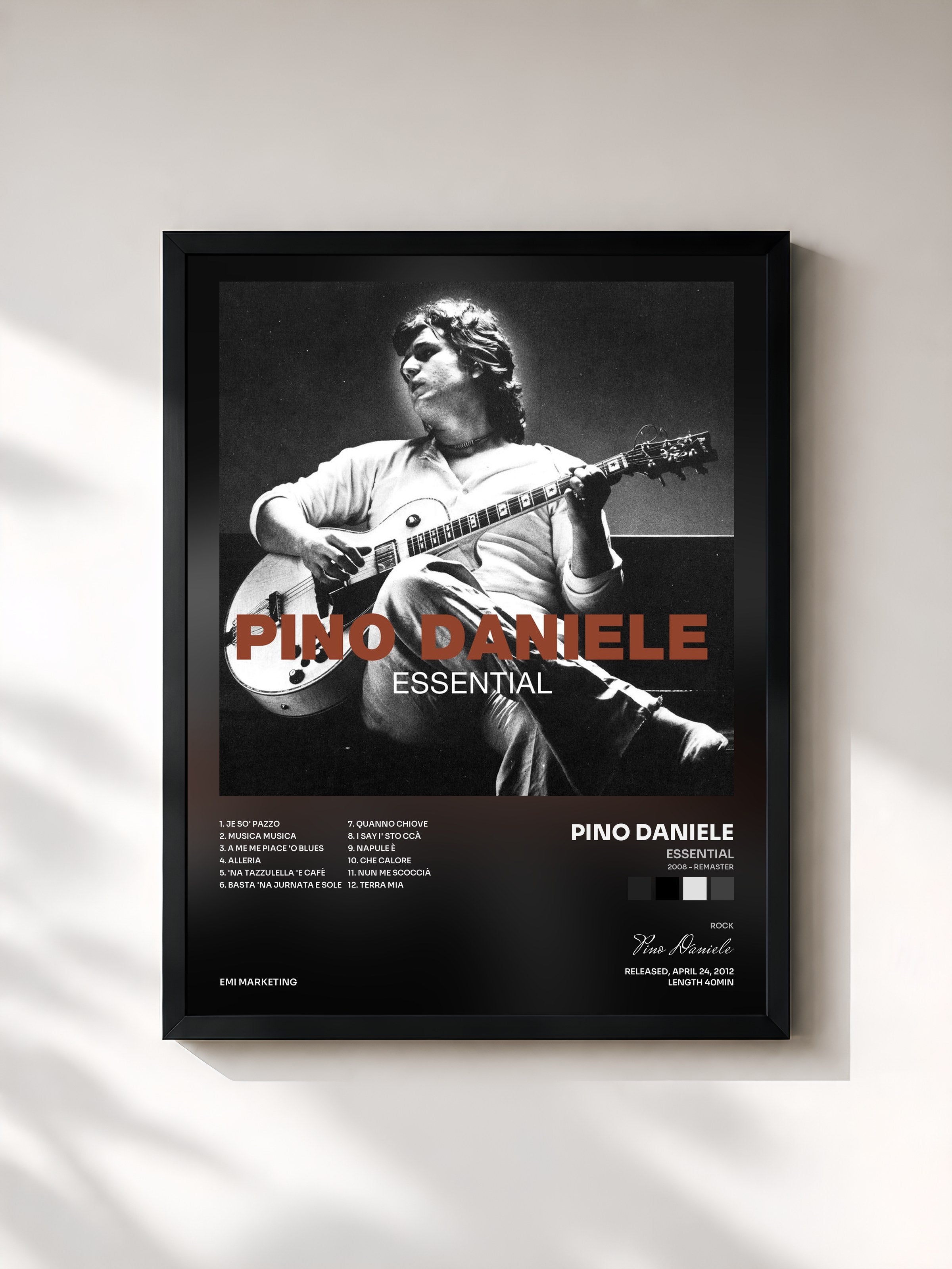#noir Tableau de l'album Essential (2008 - Remaster) de Pino Daniele, cadre noir, imprimé et encadré en France