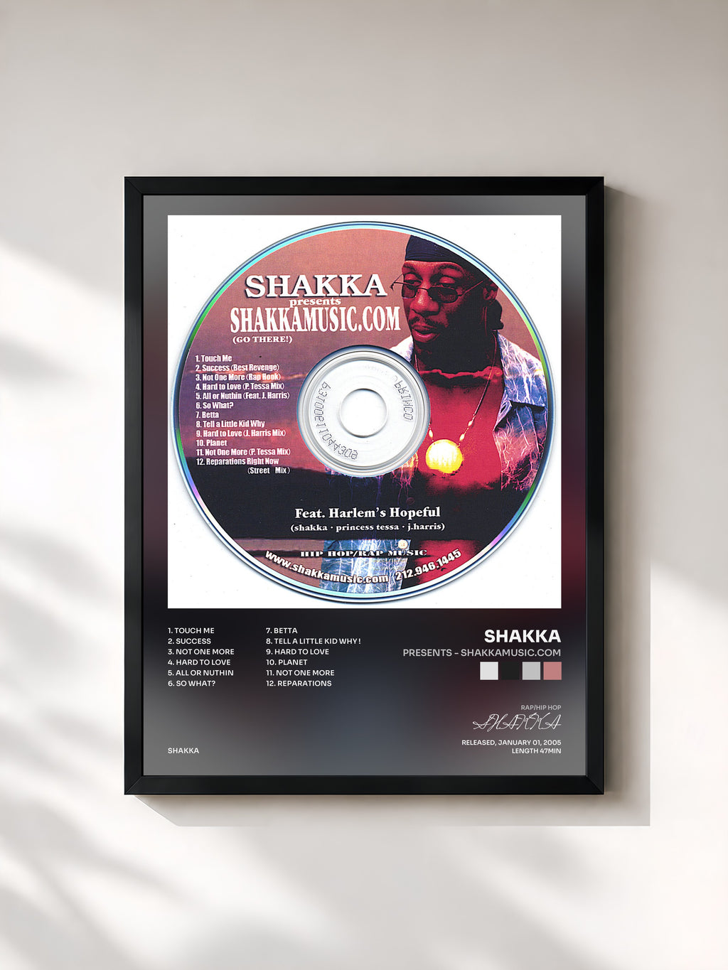 #noir Tableau de l'album presents - SHAKKAMUSIC.COM de SHAKKA, cadre noir, imprimé et encadré en France