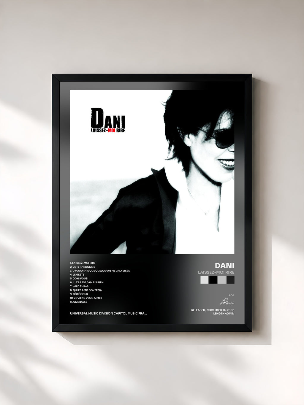 #noir Tableau de l'album Laissez-Moi Rire de Dani, cadre noir, imprimé et encadré en France