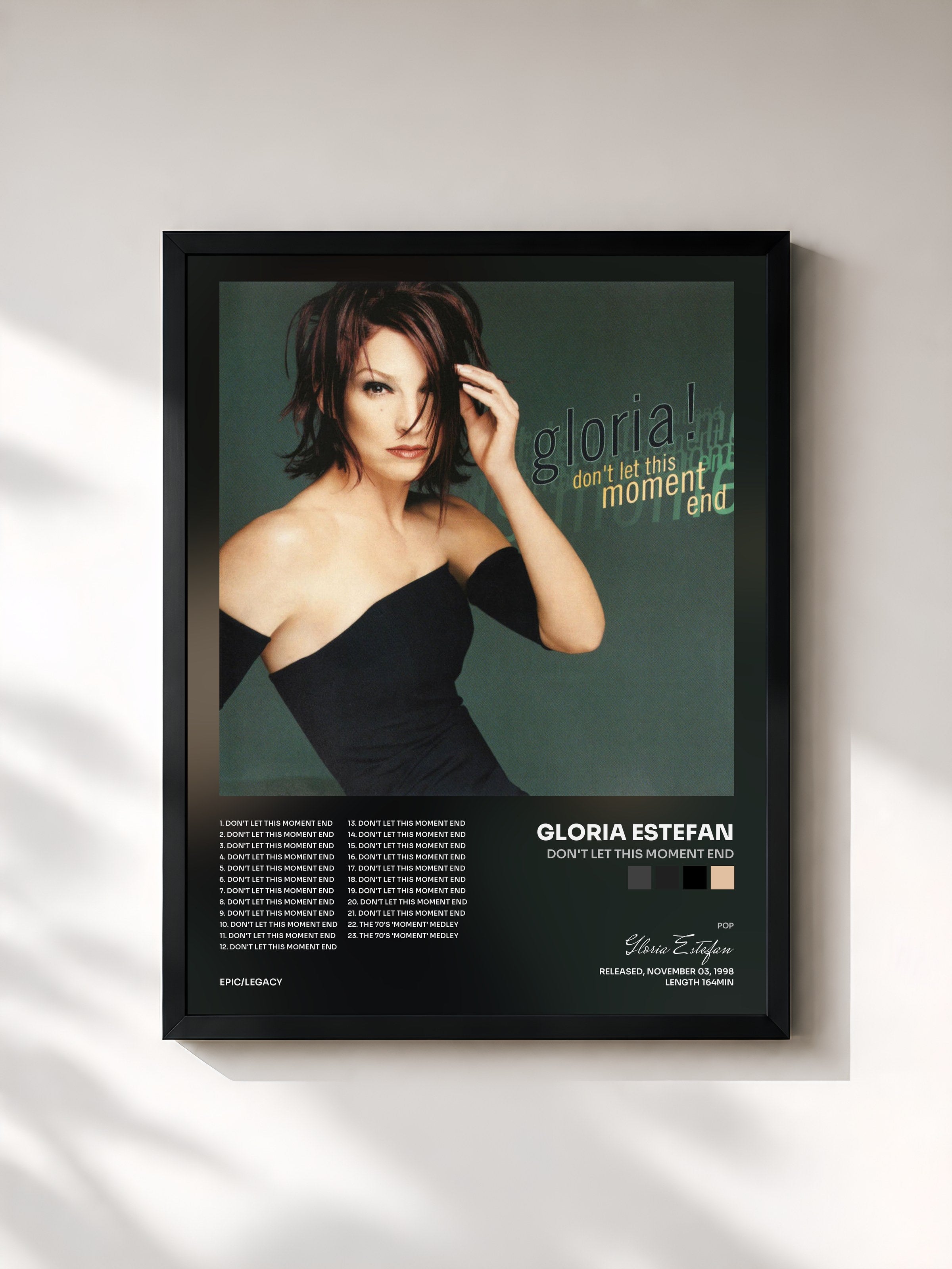 #noir Tableau de l'album Don't Let This Moment End de Gloria Estefan, cadre noir, imprimé et encadré en France