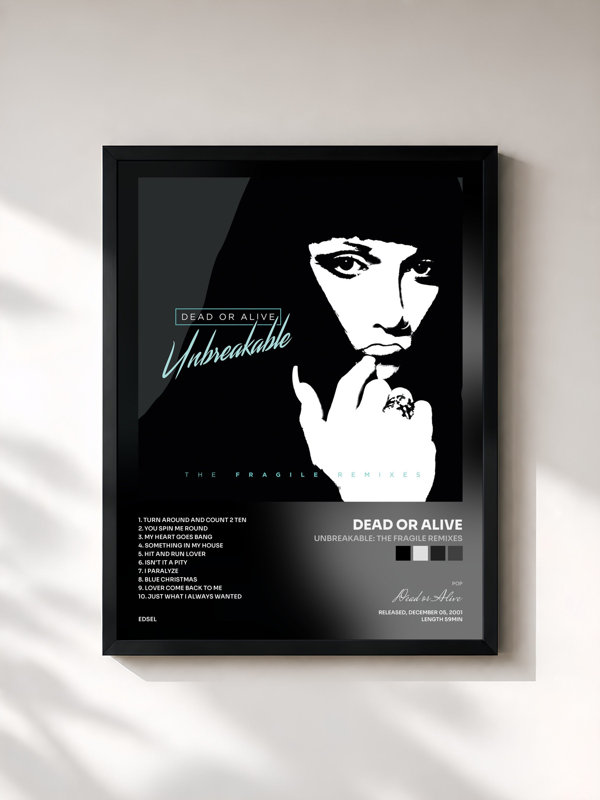 #noir Tableau de l'album Unbreakable: The Fragile Remixes de Dead or Alive, cadre noir, imprimé et encadré en France