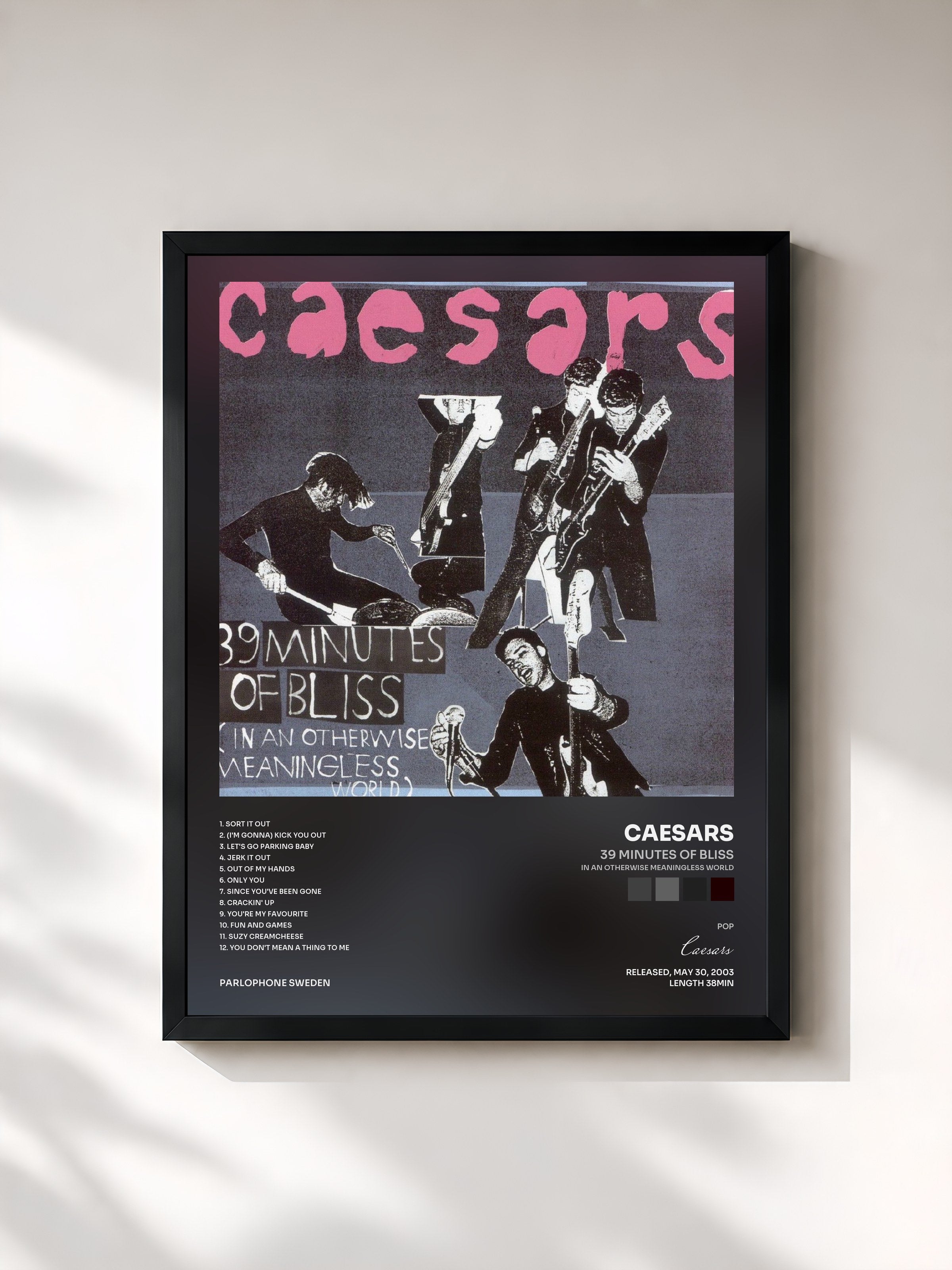 #noir Tableau de l'album 39 Minutes Of Bliss (In An Otherwise Meaningless World) de Caesars, cadre noir, imprimé et encadré en France