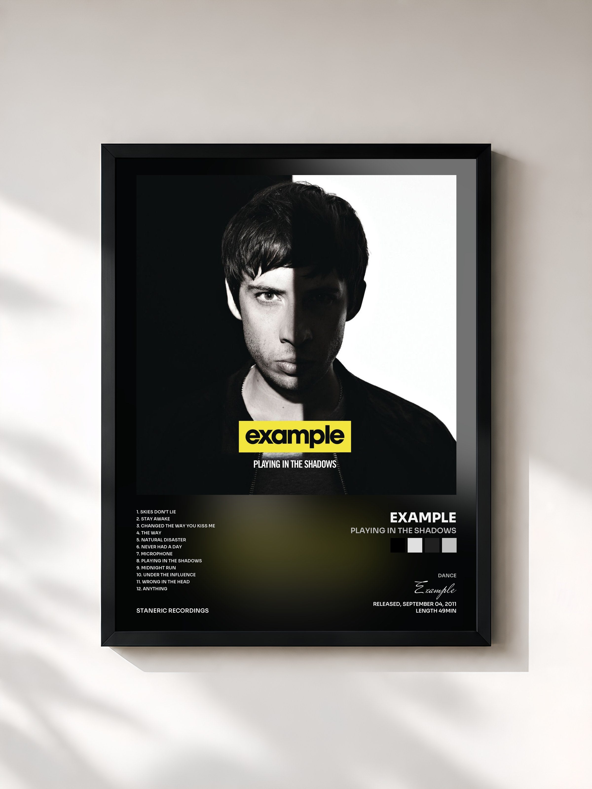 #noir Tableau de l'album Playing In The Shadows de Example, cadre noir, imprimé et encadré en France