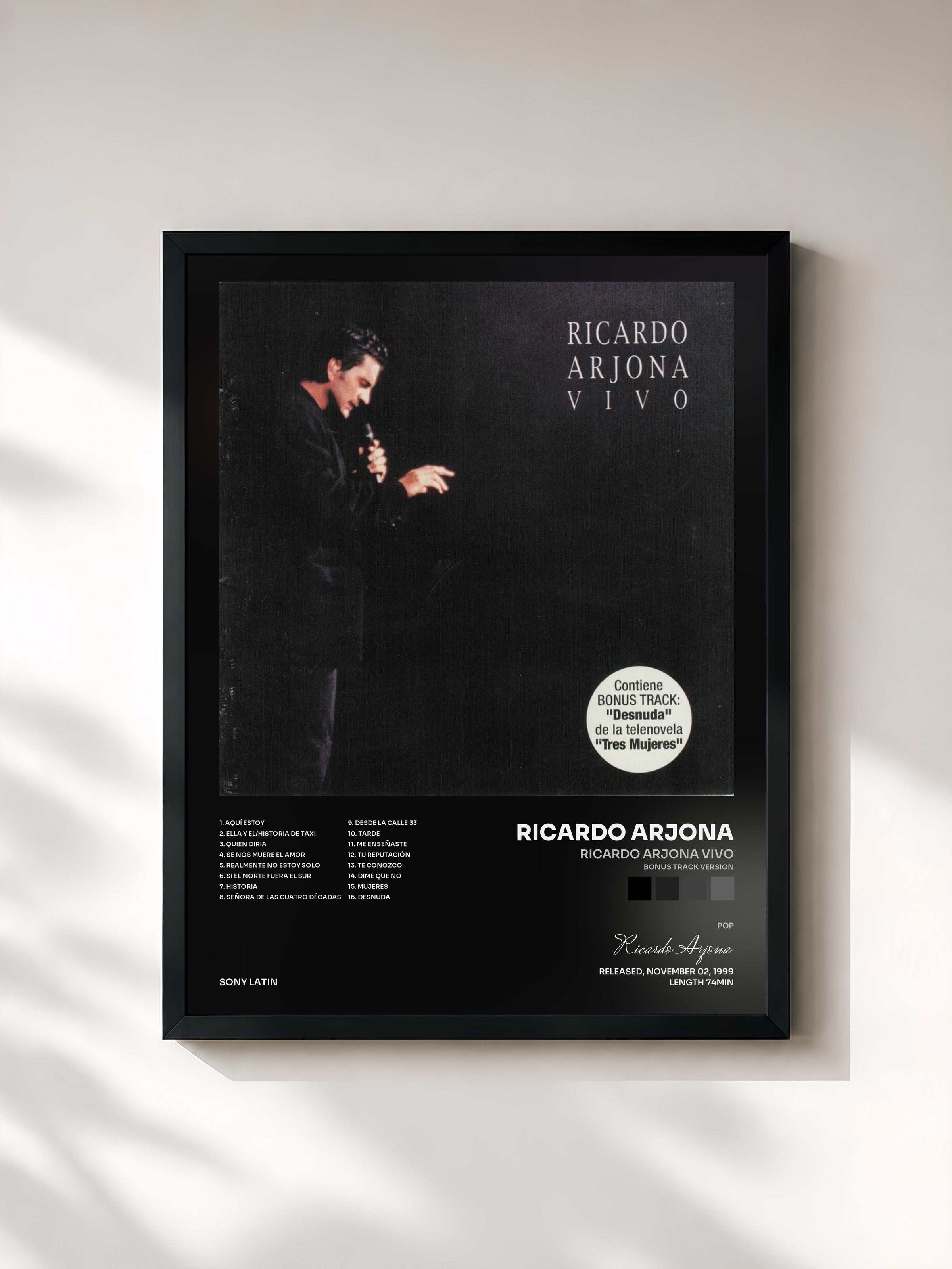 #noir Tableau de l'album Ricardo Arjona Vivo (Bonus Track Version) de Ricardo Arjona, cadre noir, imprimé et encadré en France