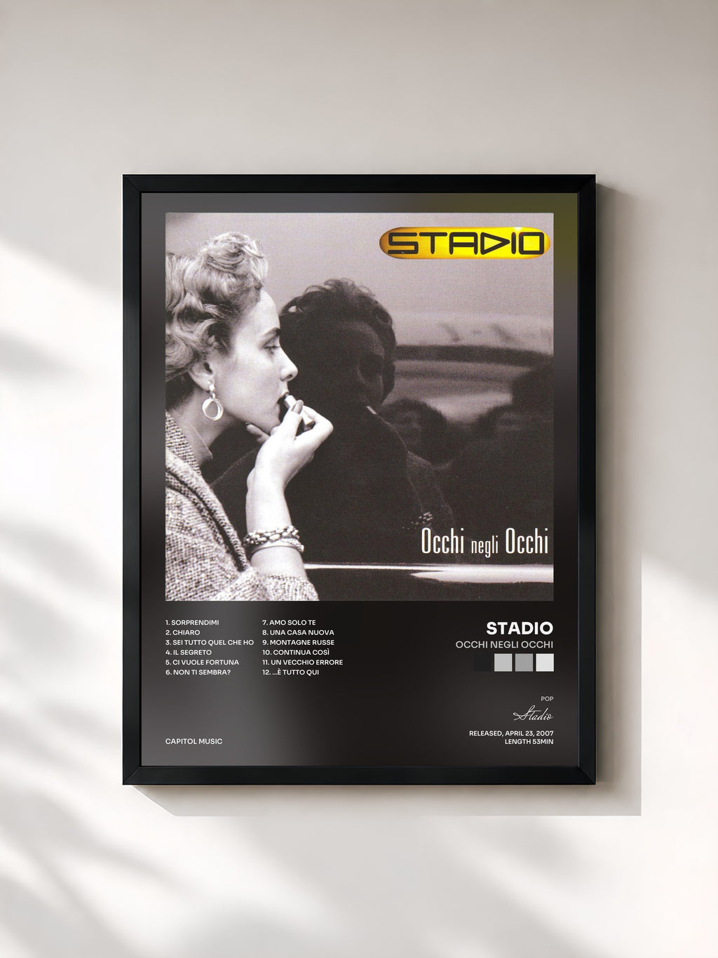 #noir Tableau de l'album Occhi Negli Occhi de Stadio, cadre noir, imprimé et encadré en France