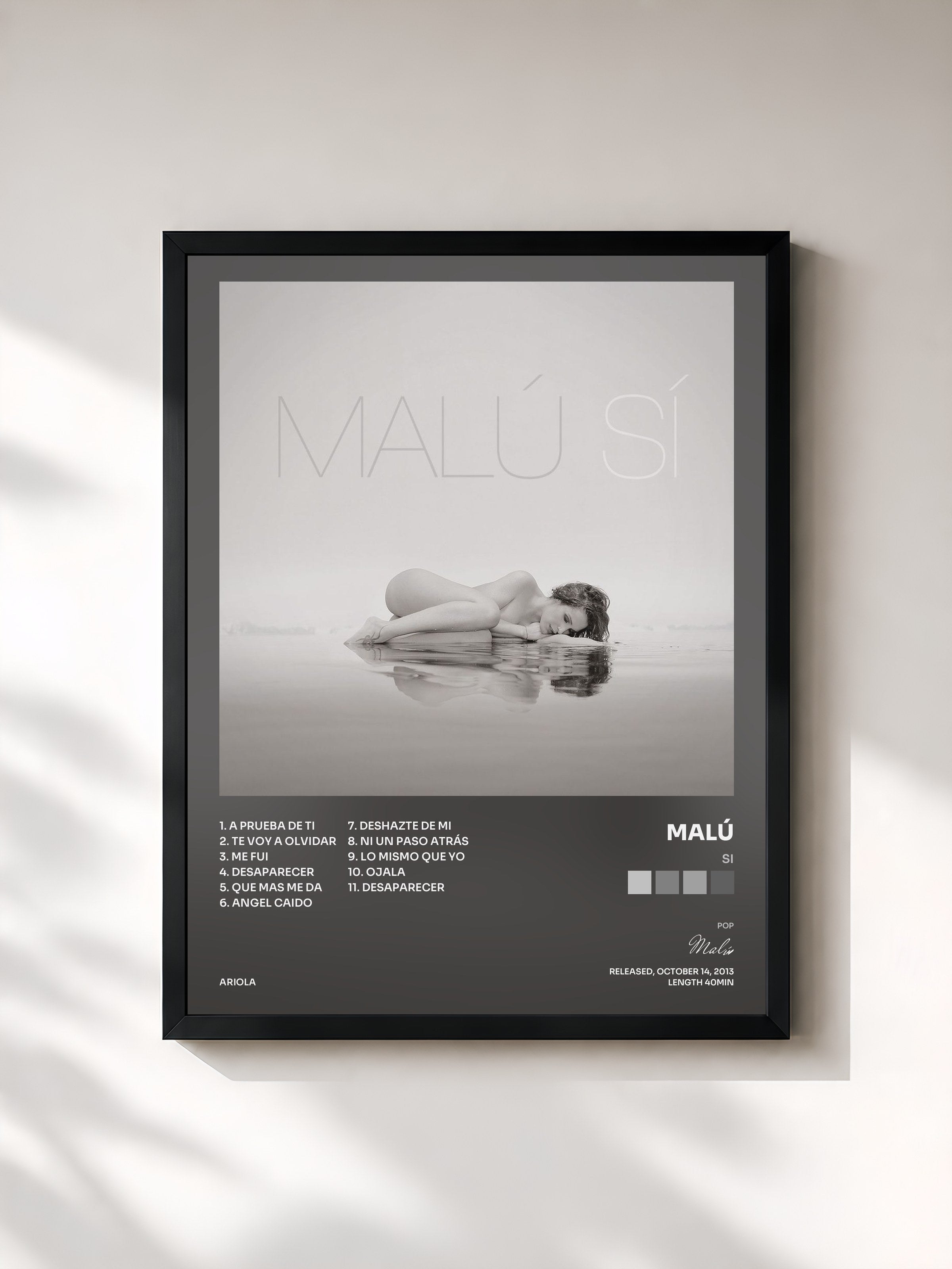 #noir Tableau de l'album Si de Malú, cadre noir, imprimé et encadré en France