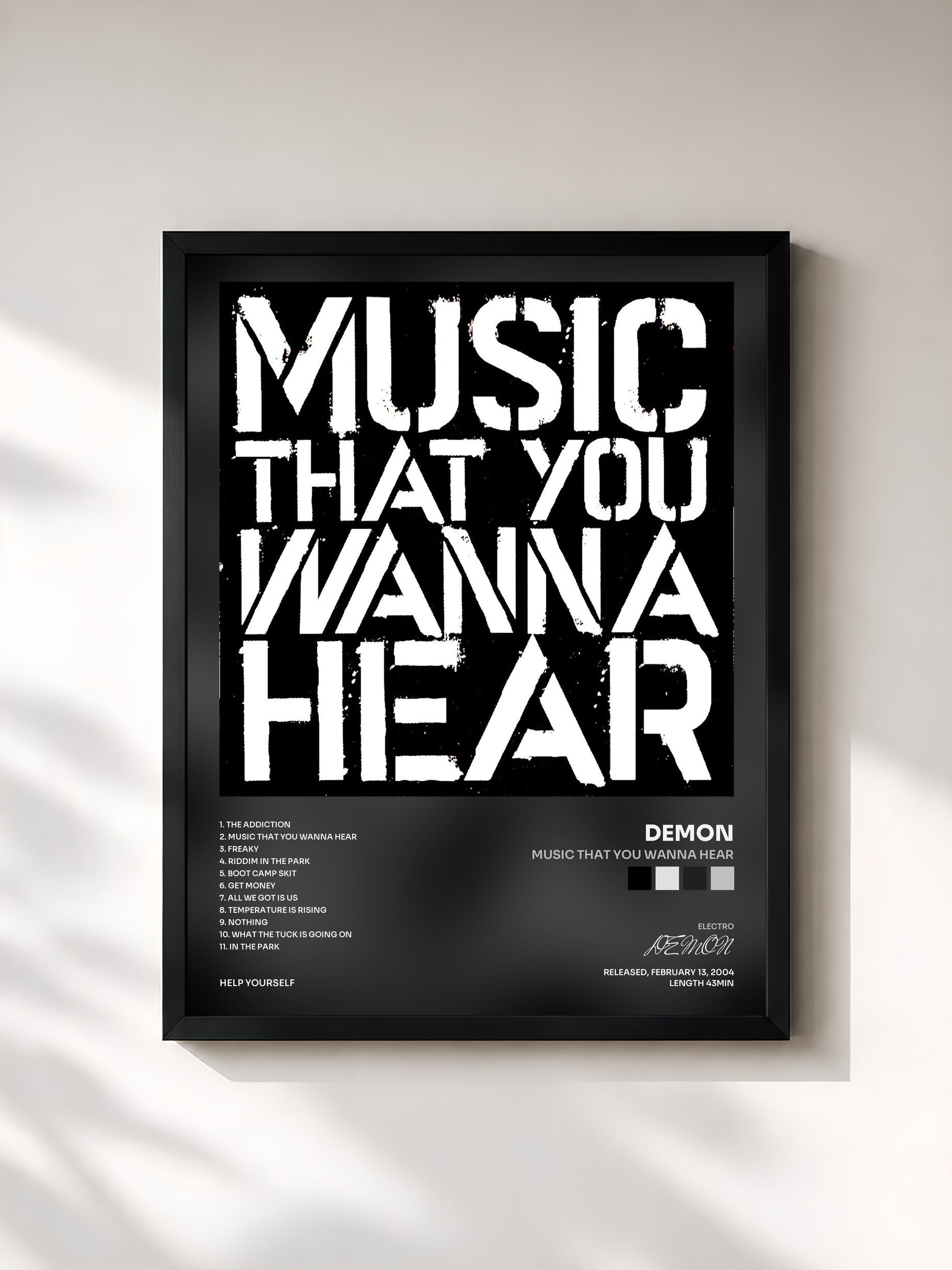 #noir Tableau de l'album Music That You Wanna Hear de DEMON, cadre noir, imprimé et encadré en France