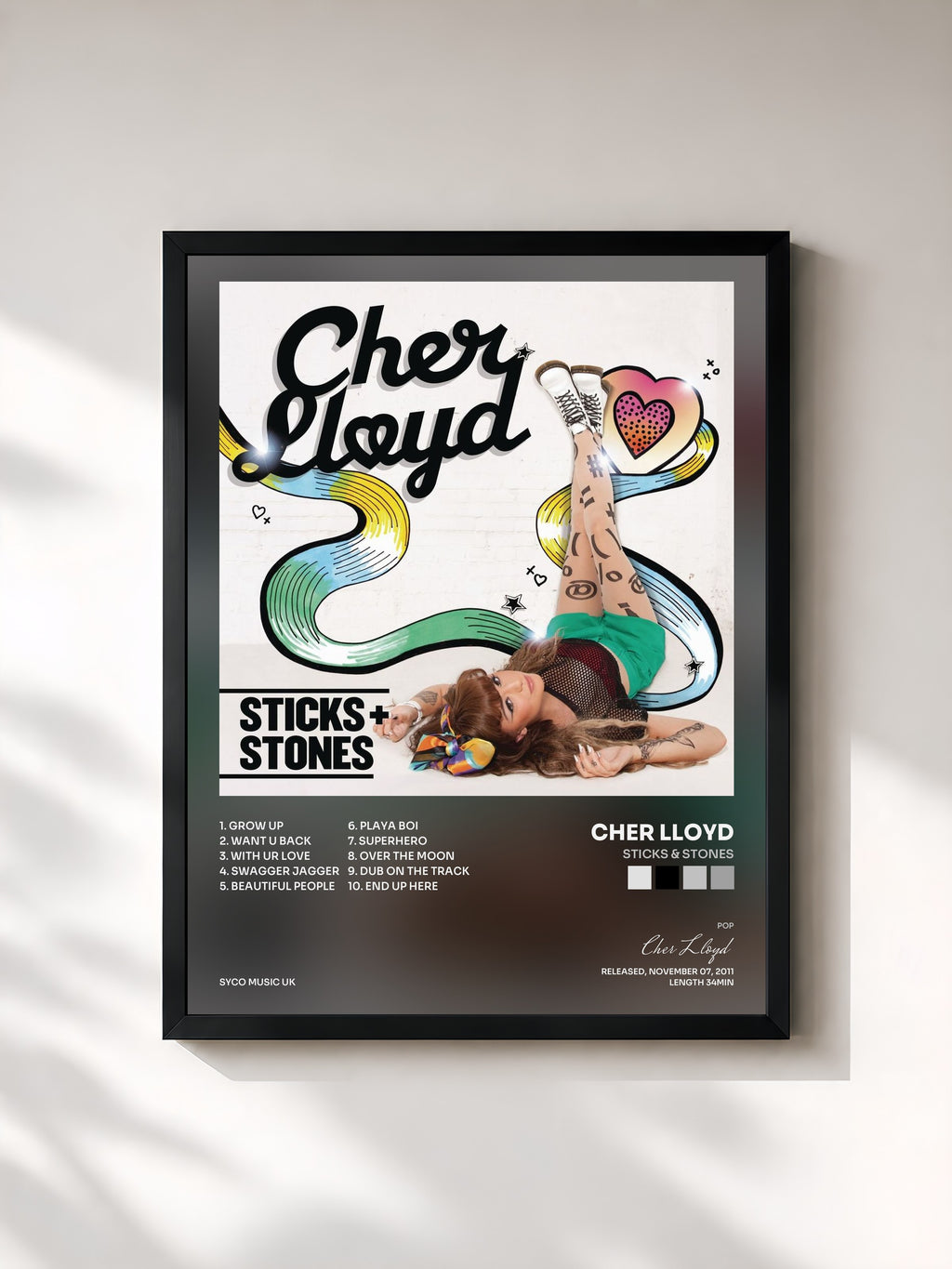 #noir Tableau de l'album Sticks & Stones de Cher Lloyd, cadre noir, imprimé et encadré en France